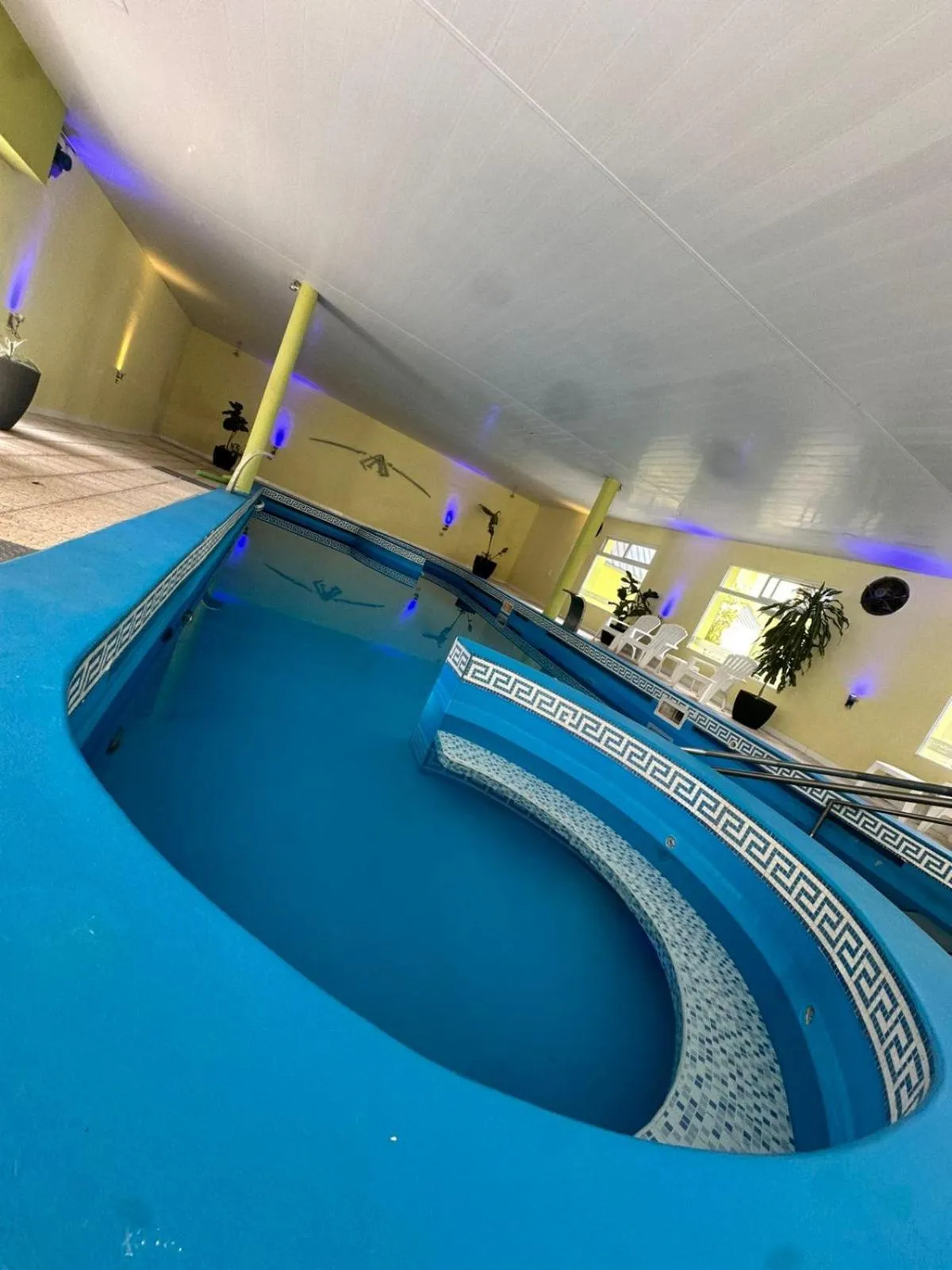 Swimming pool in Alto Verde Suite & Apart