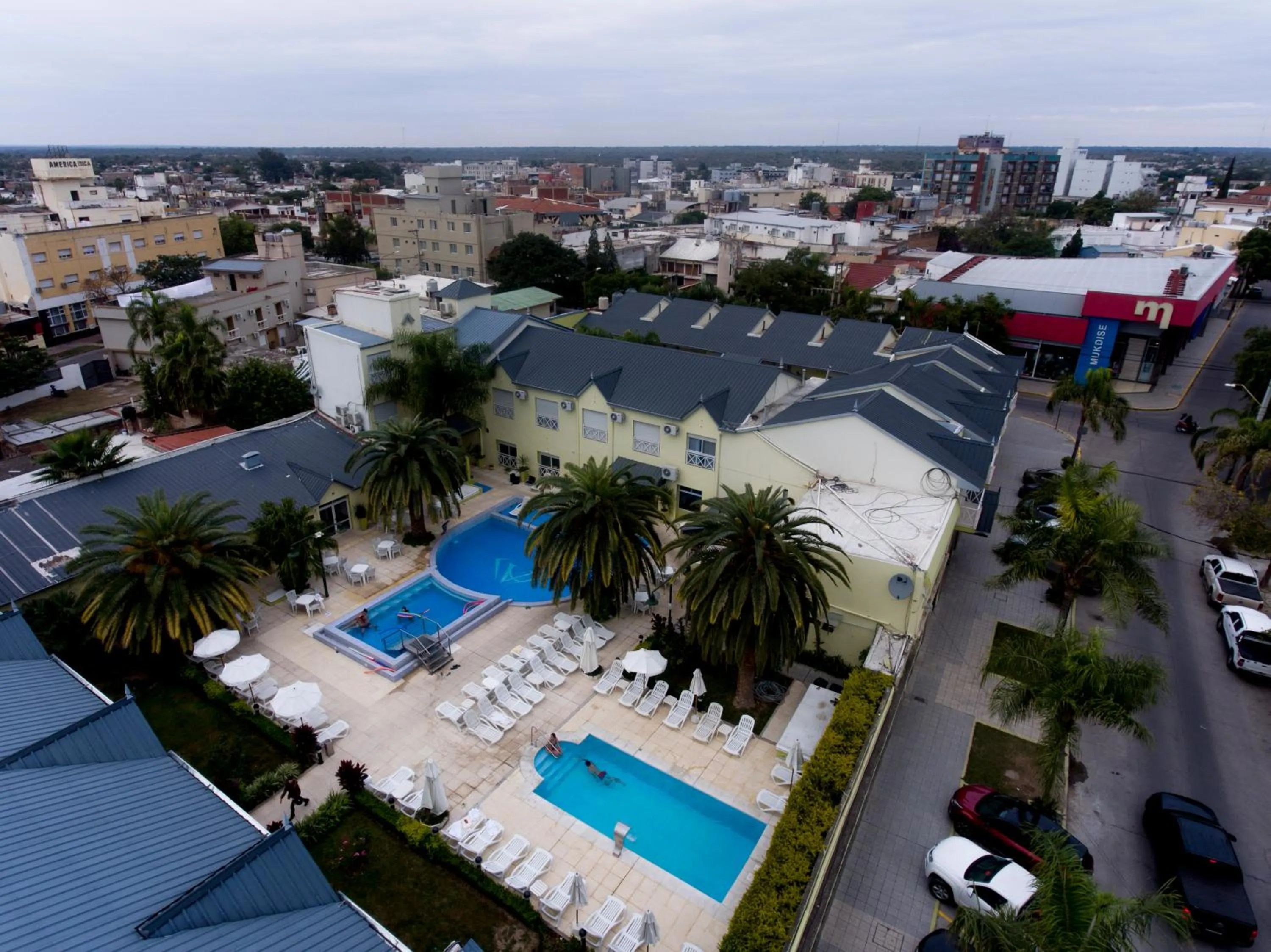 Property building in Alto Verde Suite & Apart