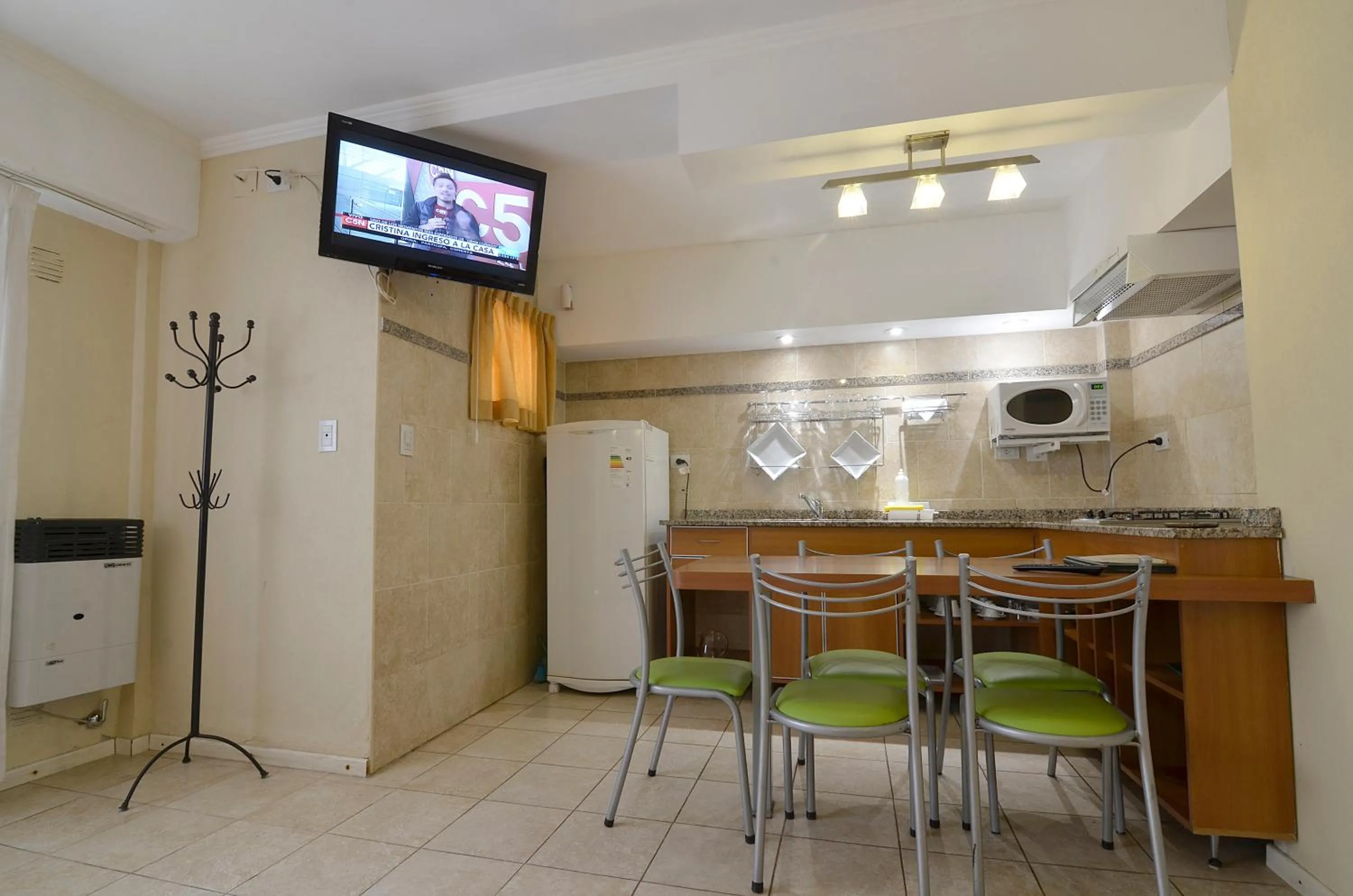 Kitchen or kitchenette in Alto Verde Suite & Apart