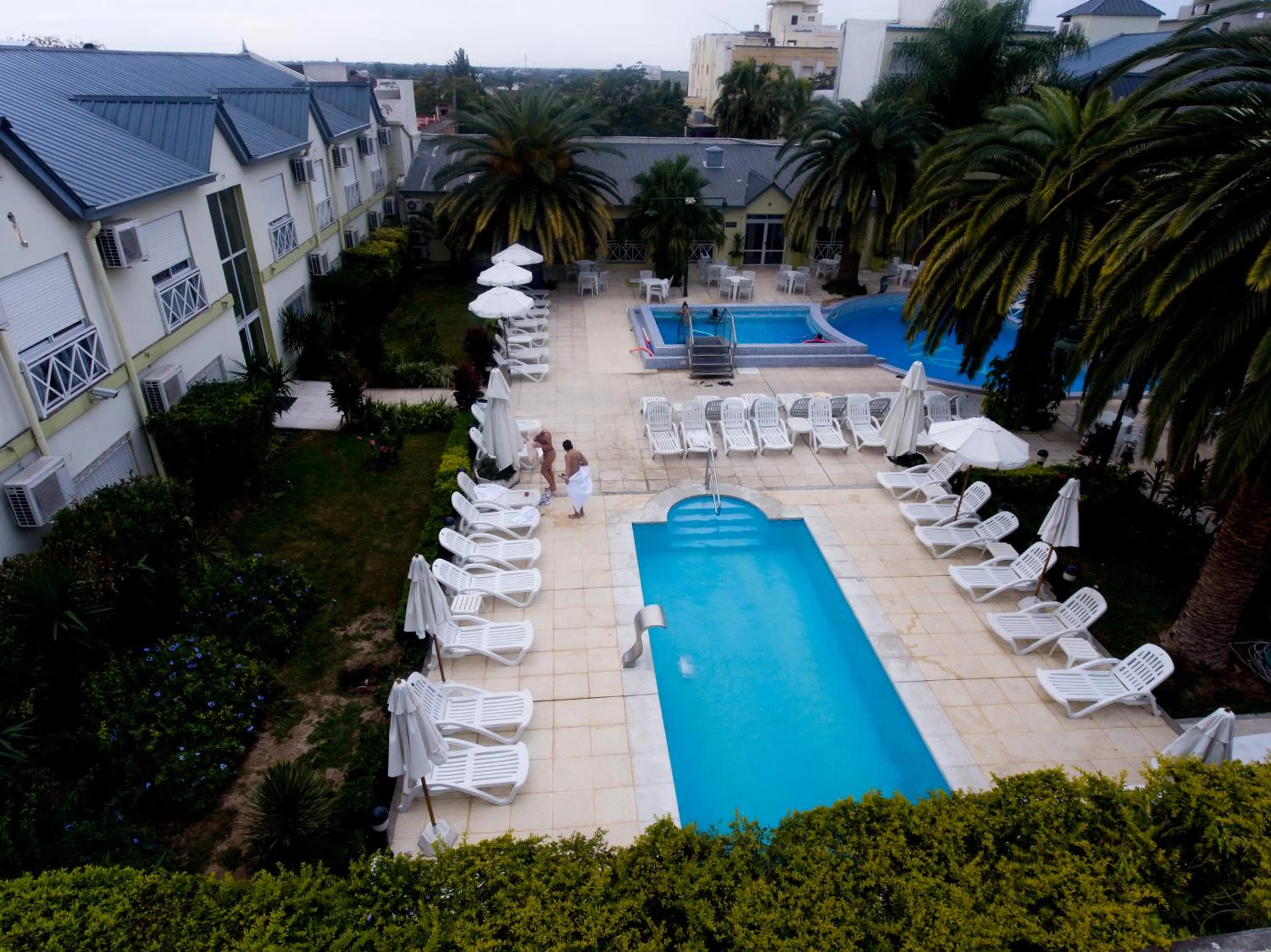 Property building in Alto Verde Suite & Apart