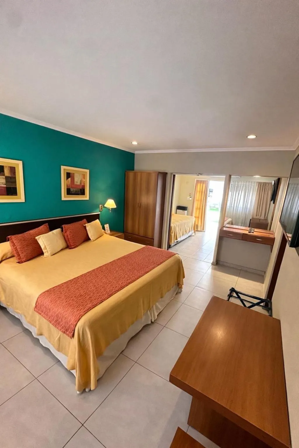 Photo of the whole room, Bed in Alto Verde Suite & Apart