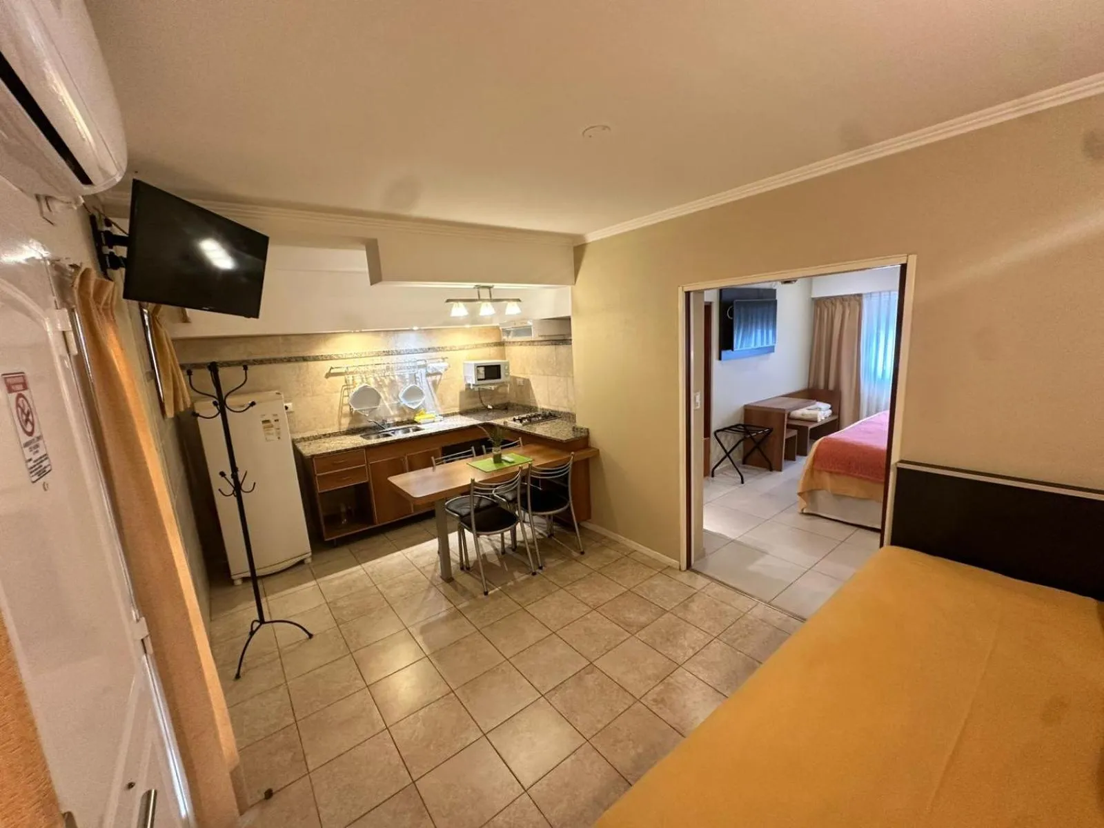 Kitchen or kitchenette, Bed in Alto Verde Suite & Apart