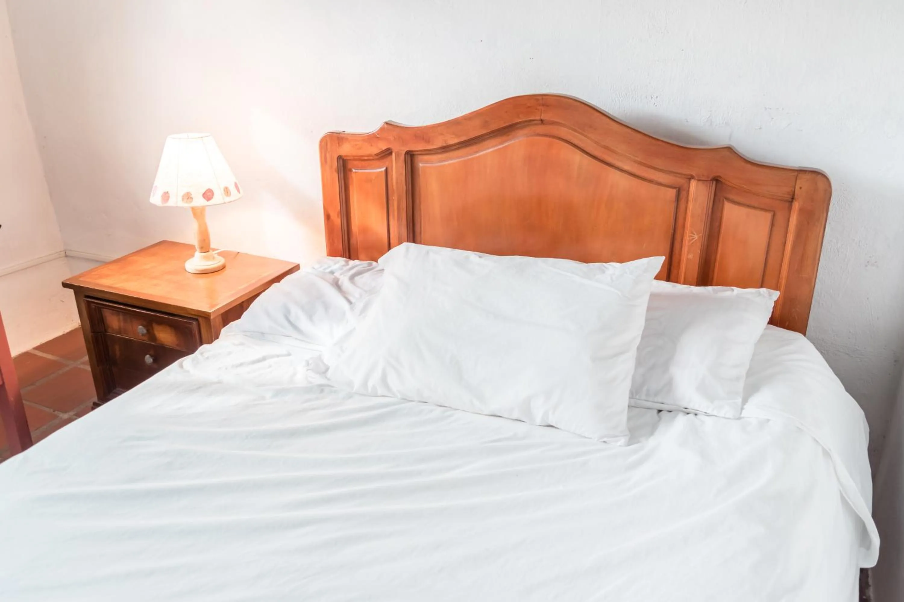 Bed in Hostería Colibri Aeropuerto