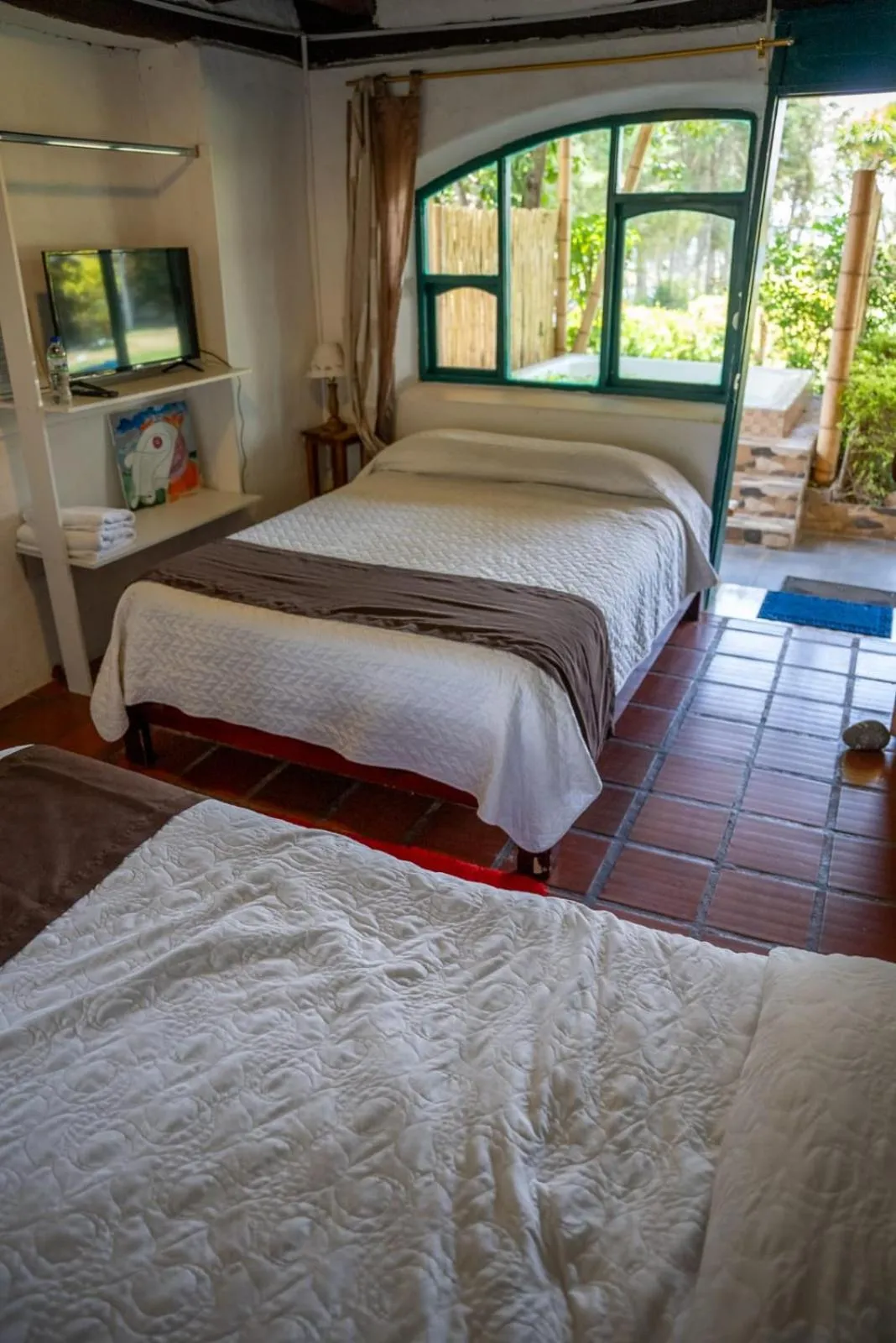 Bed in Hostería Colibri Aeropuerto