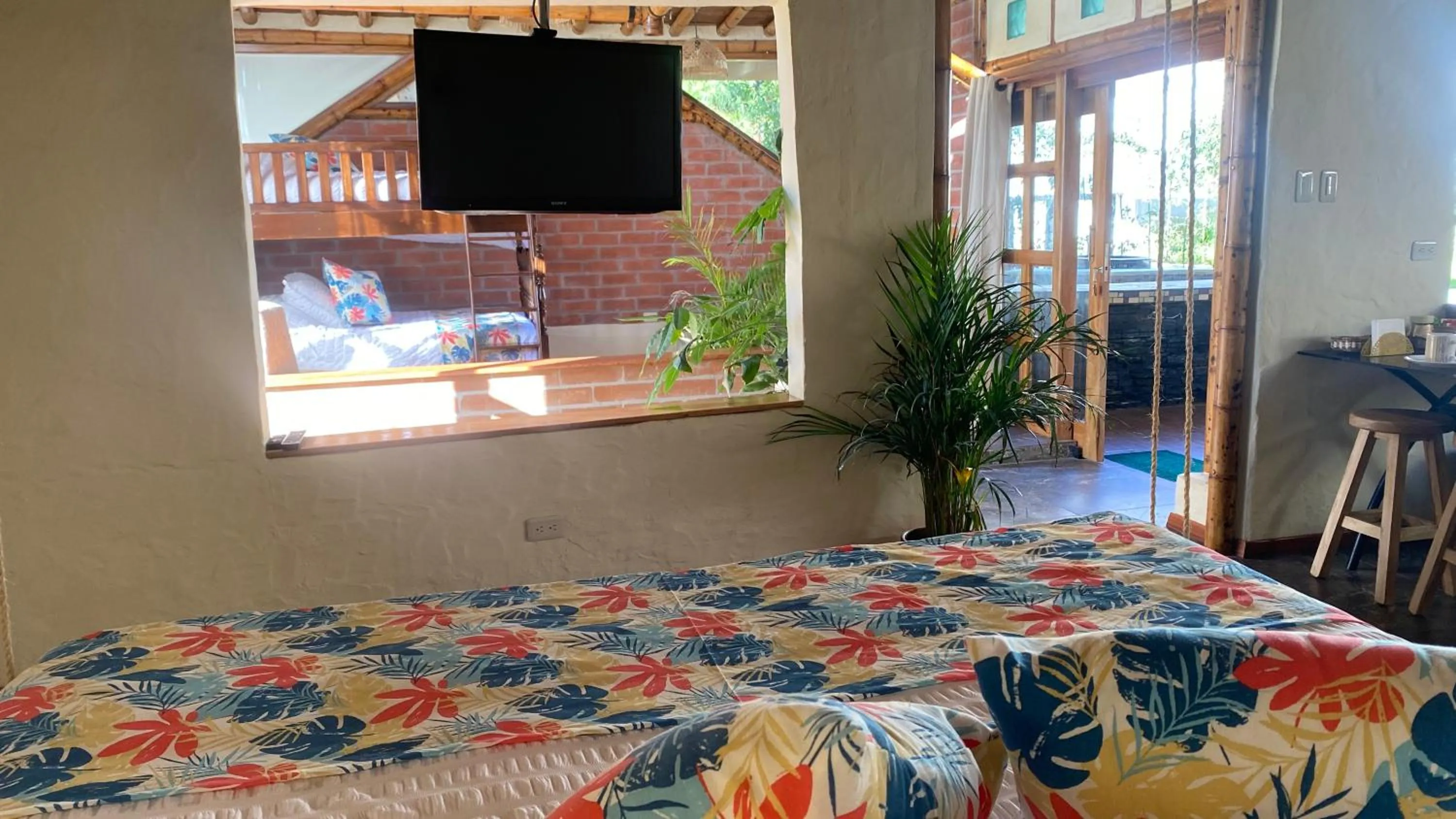 Bed in Hostería Colibri Aeropuerto