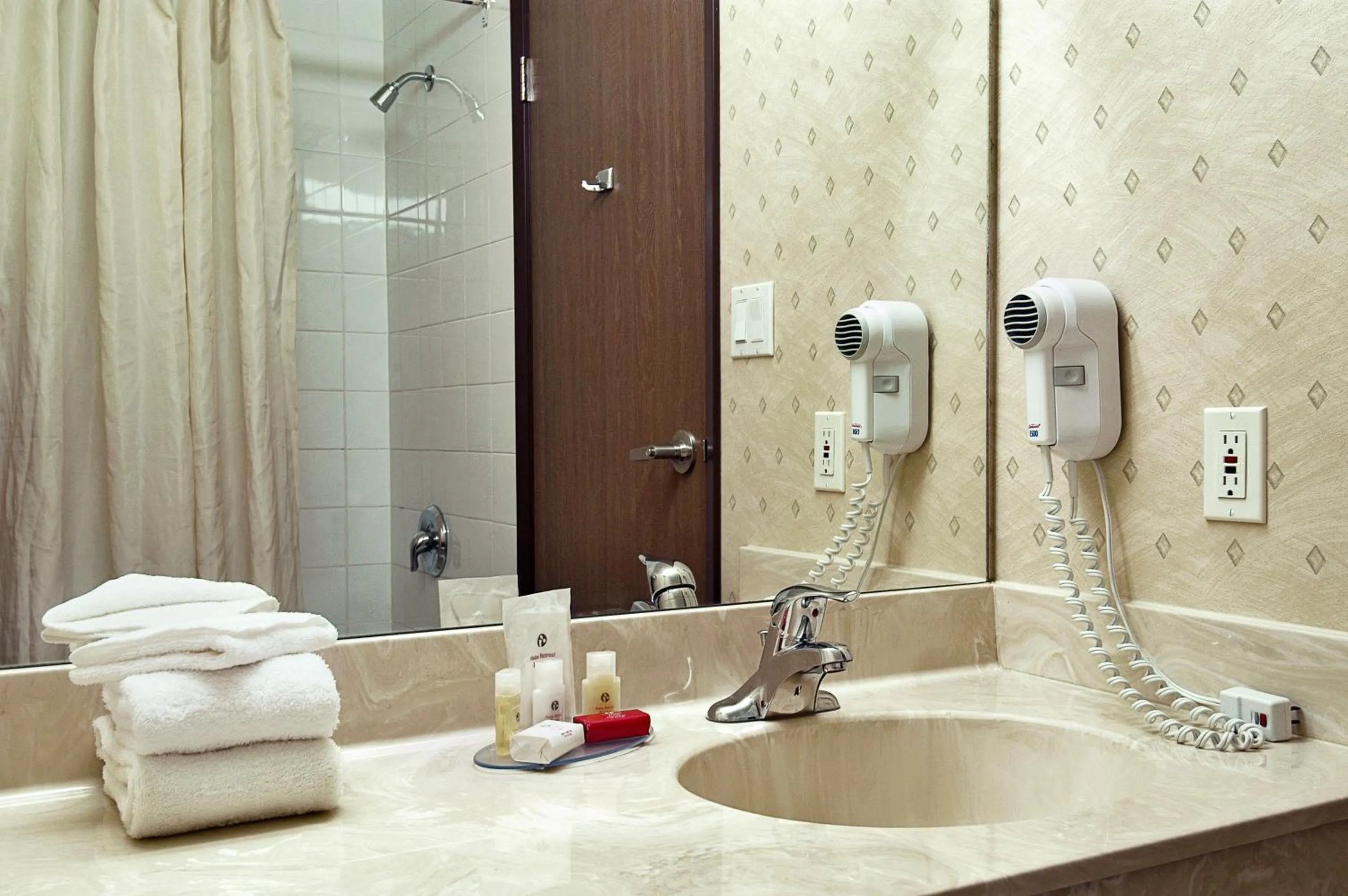 Bathroom in Ramada by Wyndham Clairmont/Grande Prairie