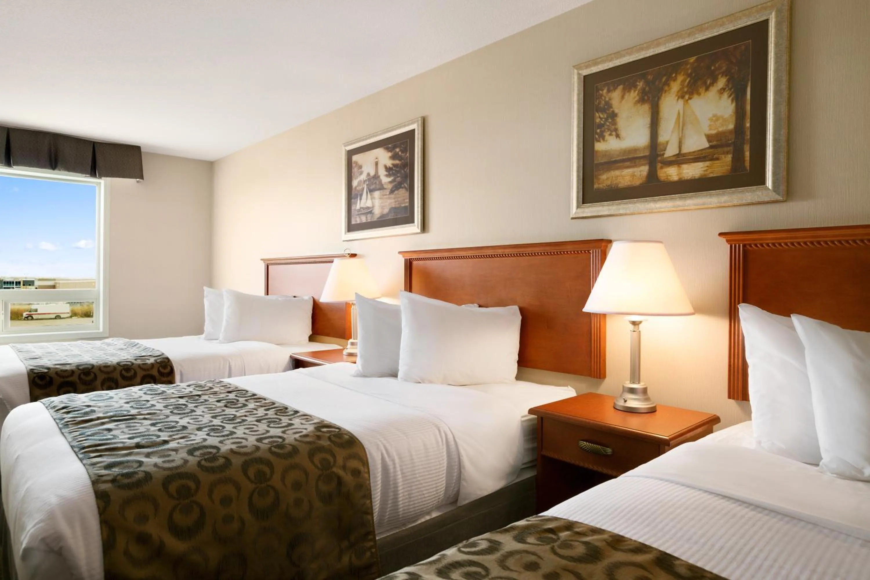 Bedroom, Bed in Ramada by Wyndham Clairmont/Grande Prairie