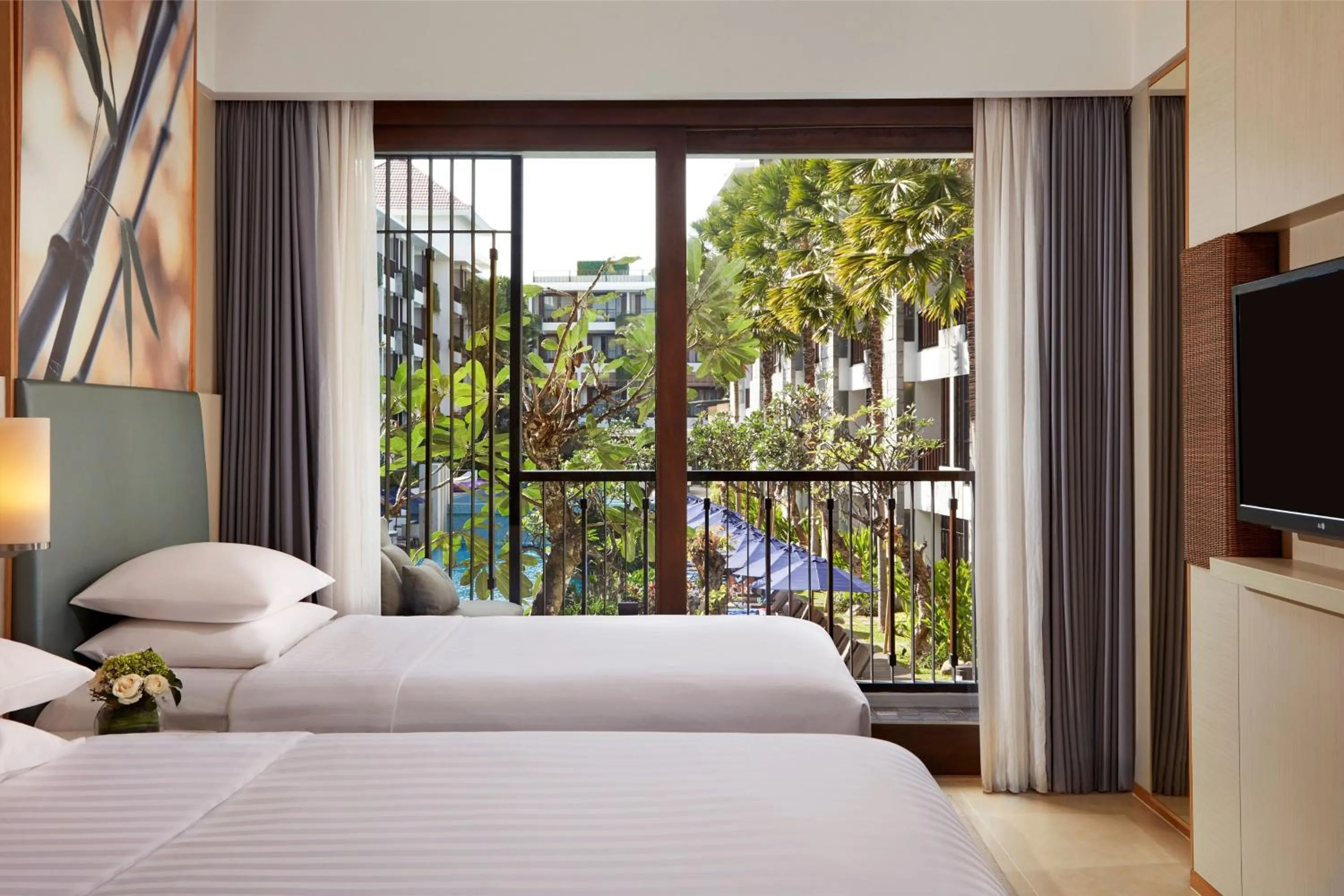 Bed in Courtyard by Marriott Bali Seminyak Resort