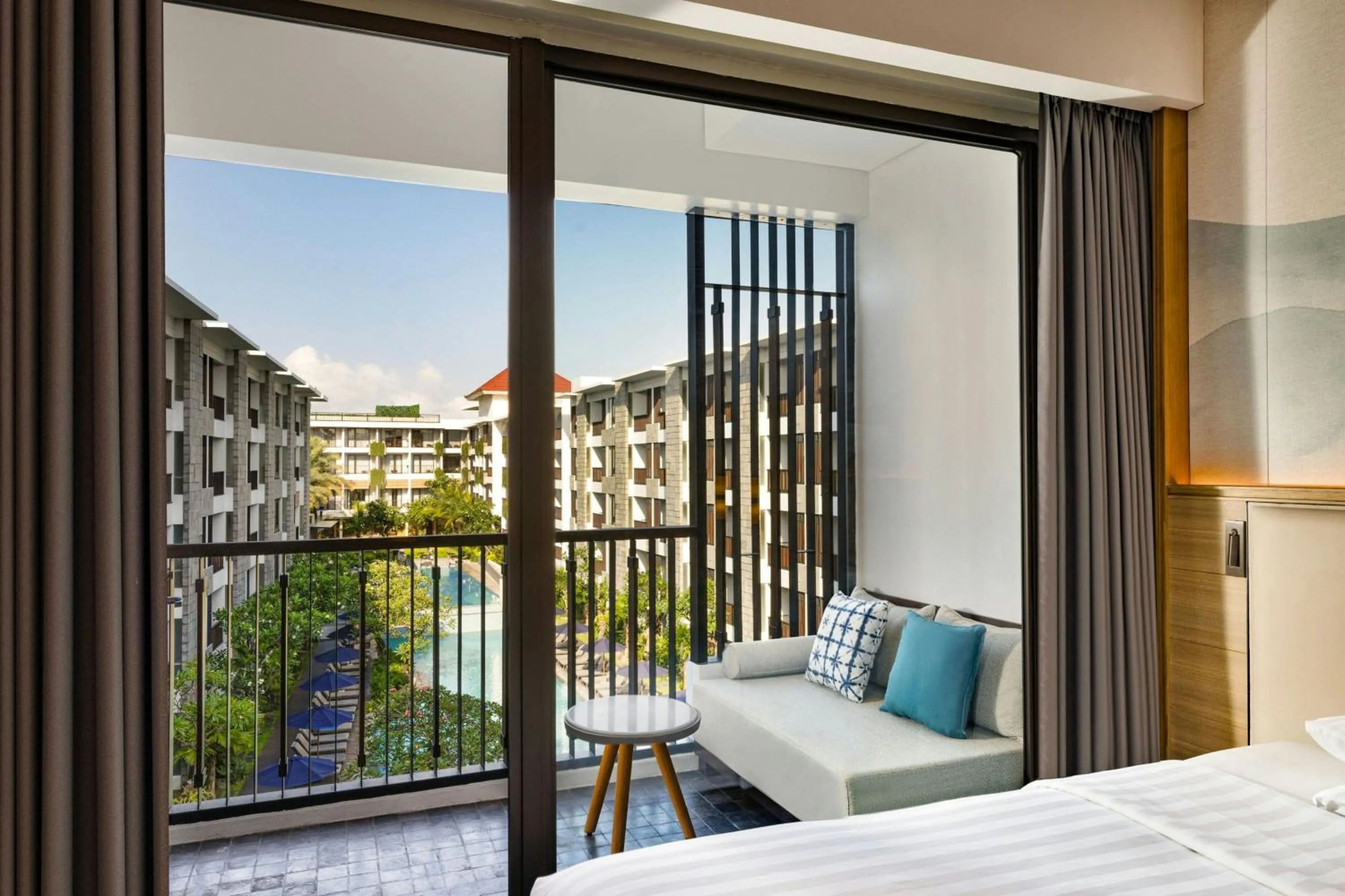 Swimming pool, Bed in Courtyard by Marriott Bali Seminyak Resort