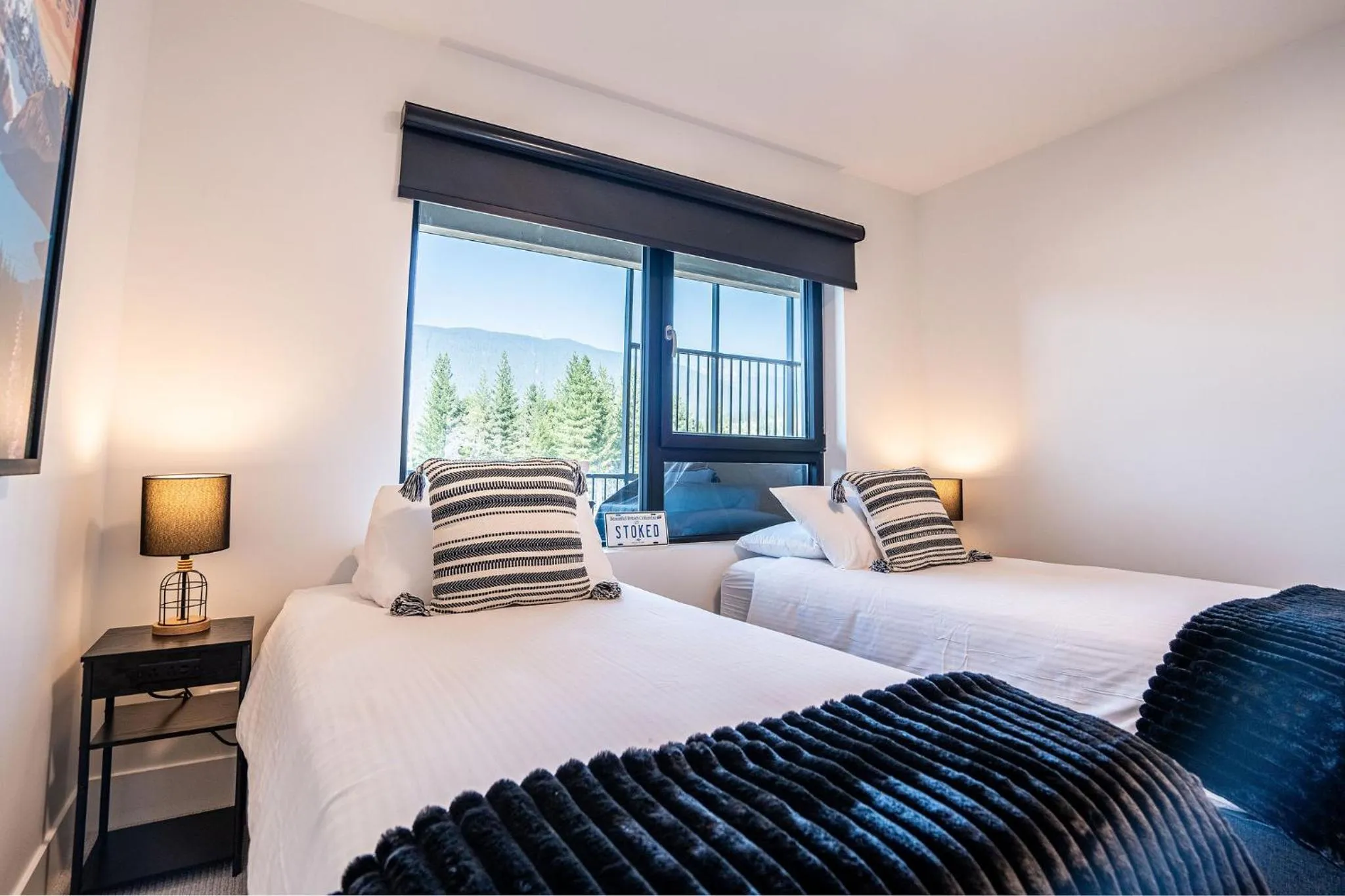 Bed in Alpine Haven by Revelstoke Vacations