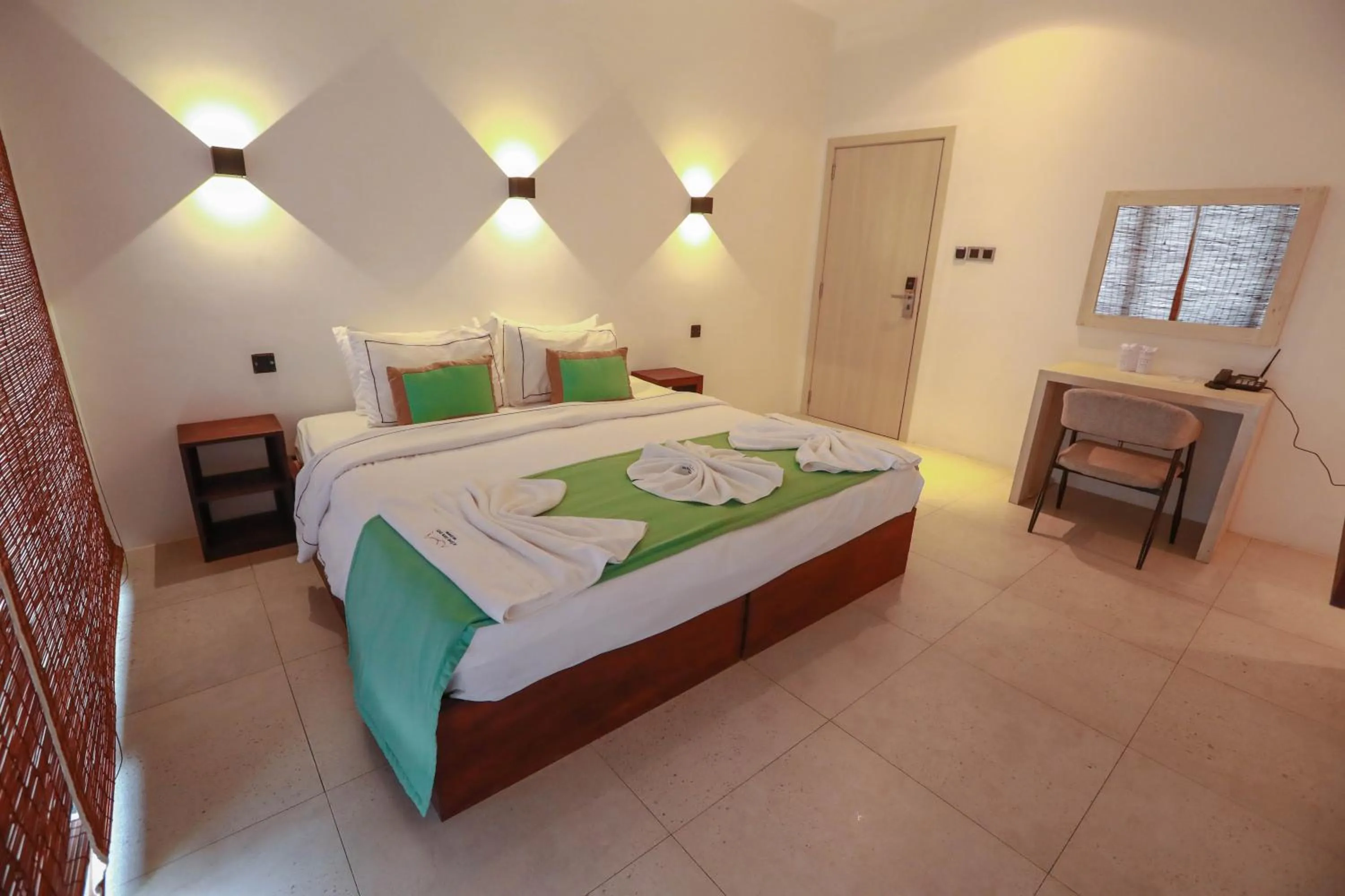 Bed in Ella Flower Garden Resort