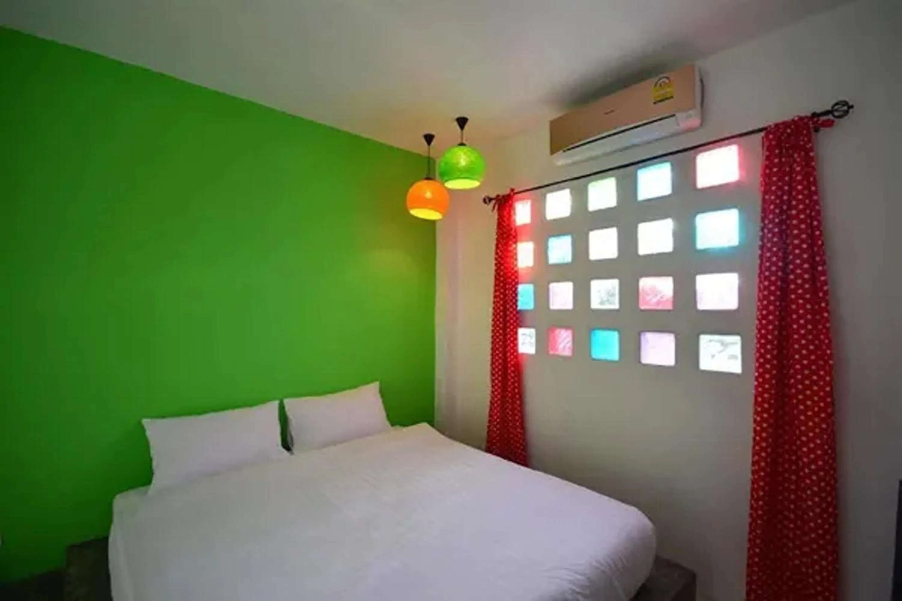 Bed in Na-Rak-O Resort