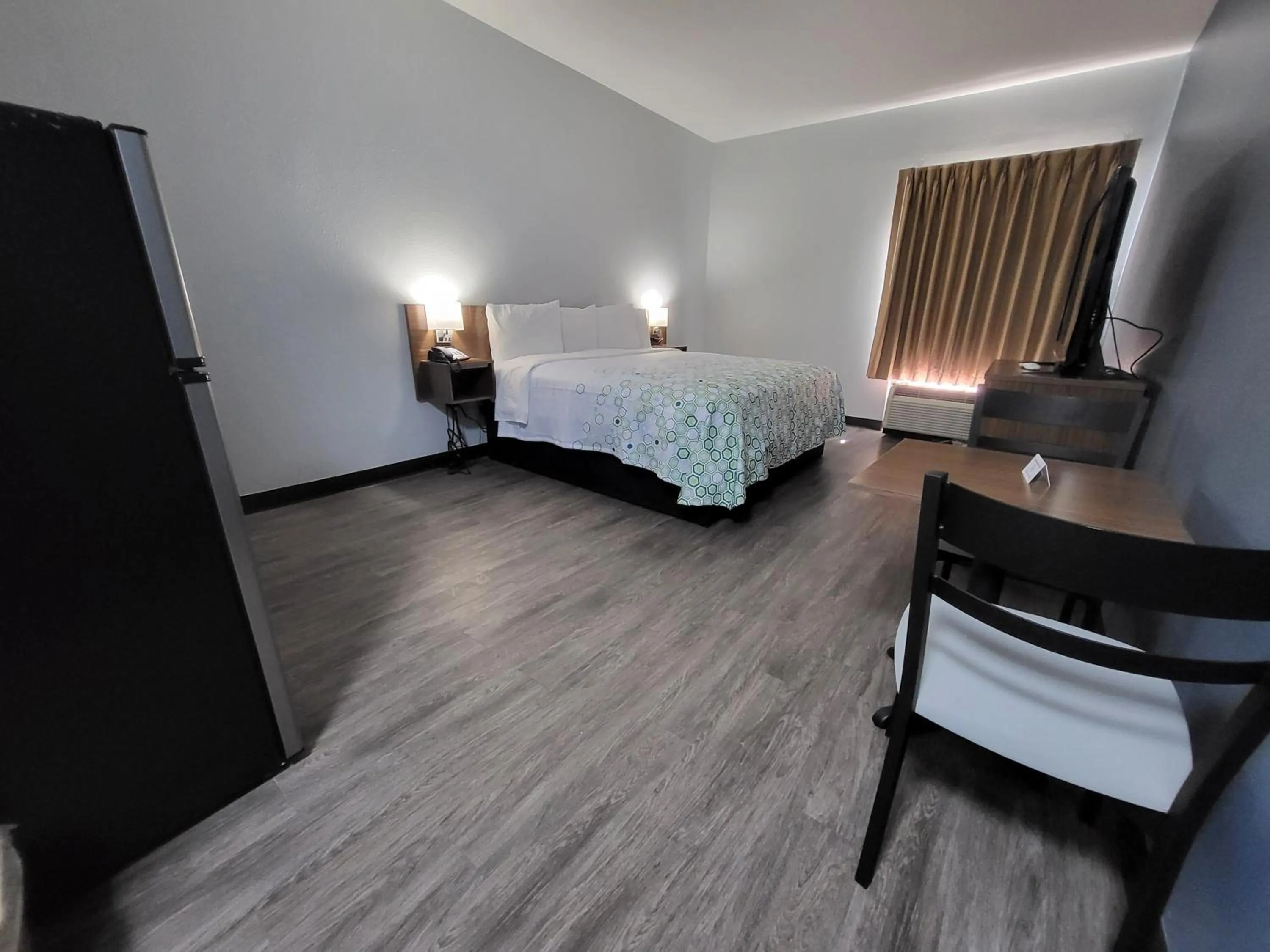 Bedroom in HomeTowne Studios by Red Roof Prattville