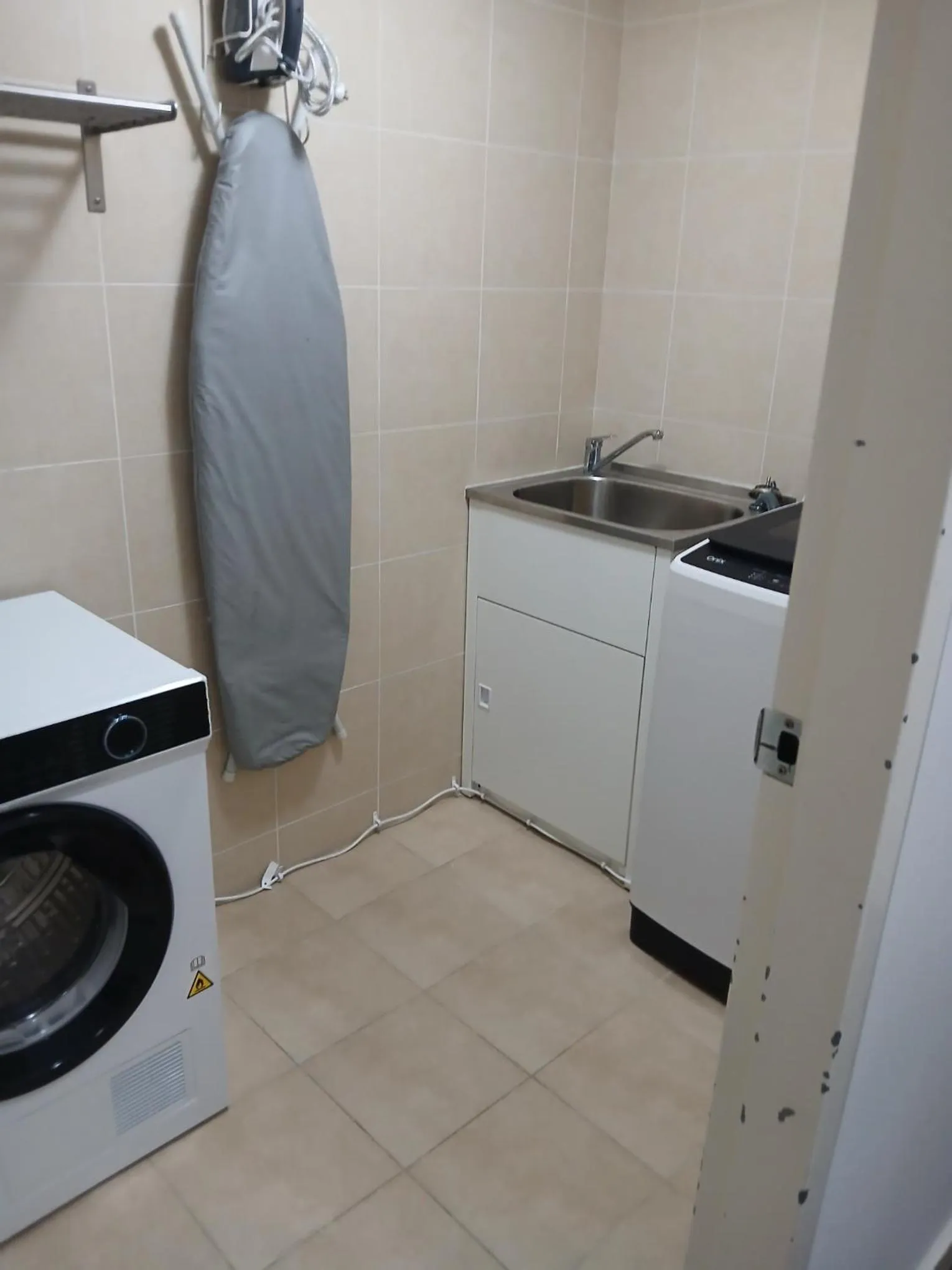 washing machine in Newcastle Central Plaza Apartment Hotel Official