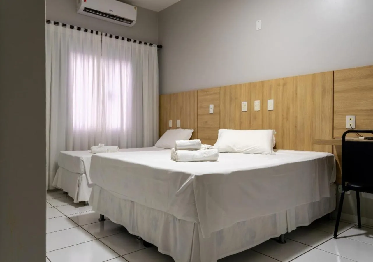Bed in FLORENÇA PALACE HOTEL