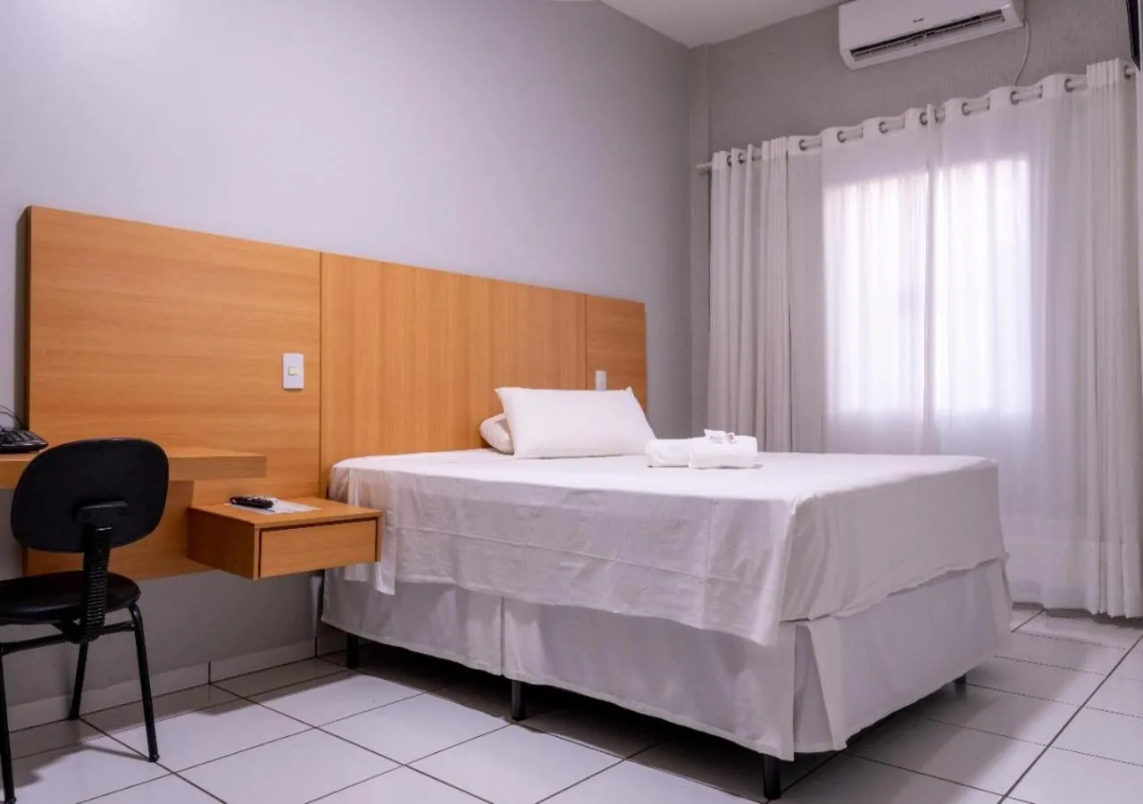 Bed in FLORENÇA PALACE HOTEL
