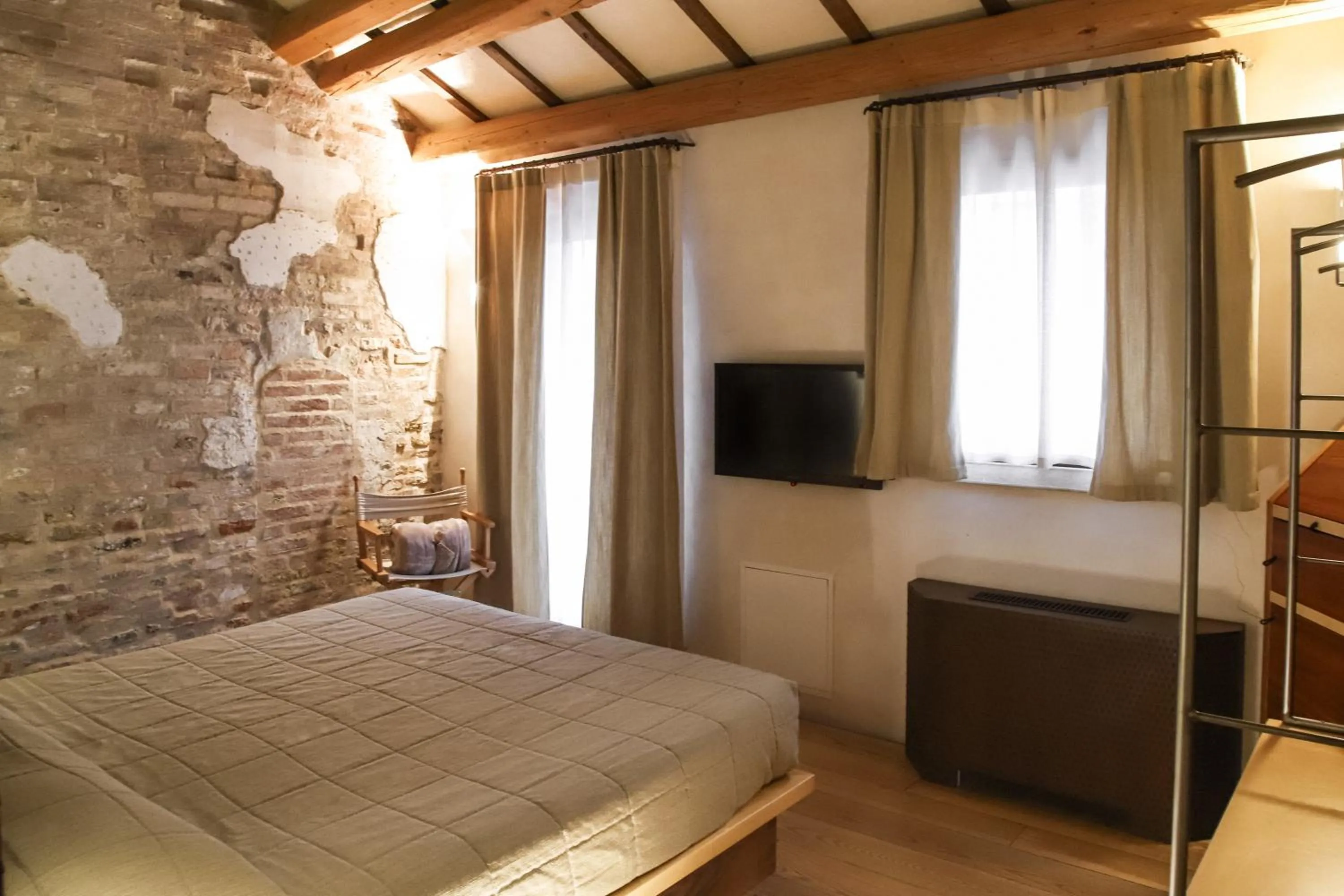 Bed in Locanda Ponte Dante