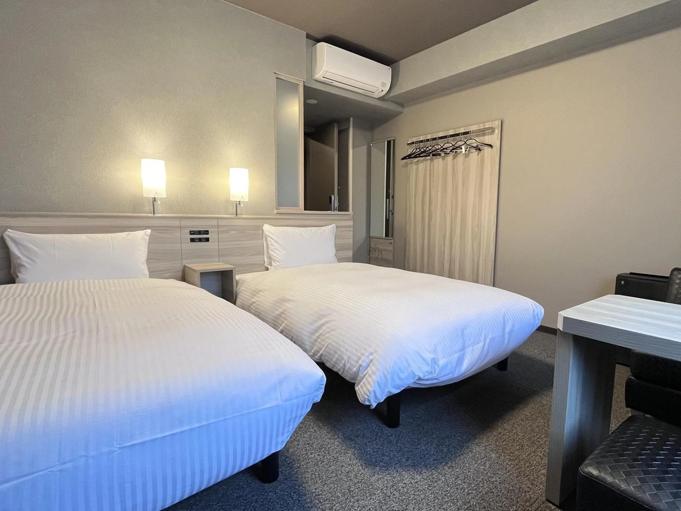Photo of the whole room, Bed in Hotel Route Inn Kuwana