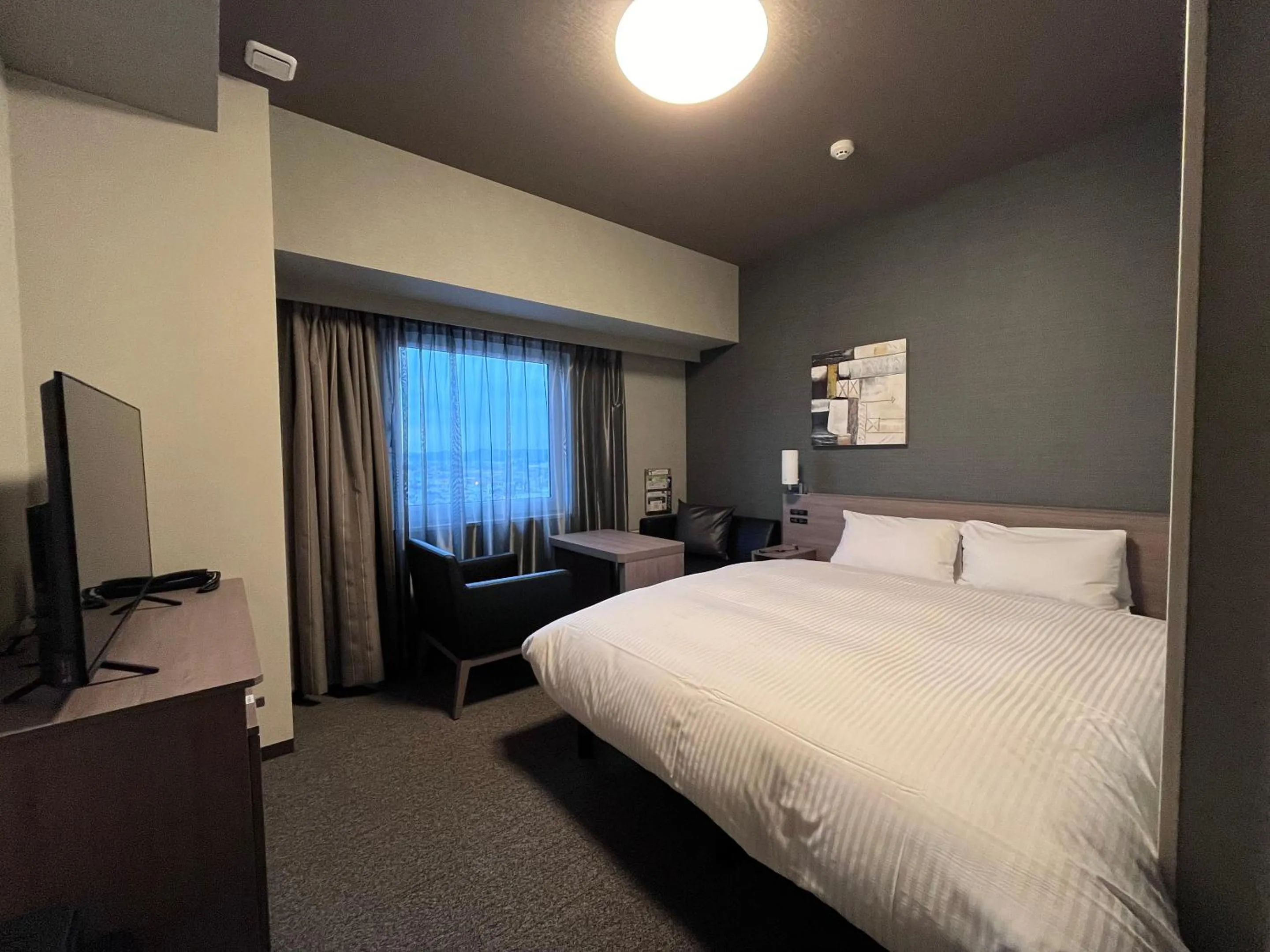 Photo of the whole room, Bed in Hotel Route Inn Kuwana