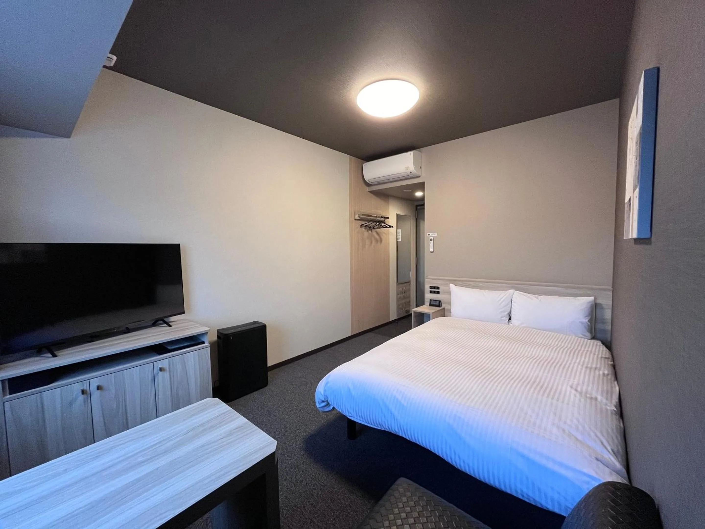 Photo of the whole room, Bed in Hotel Route Inn Kuwana