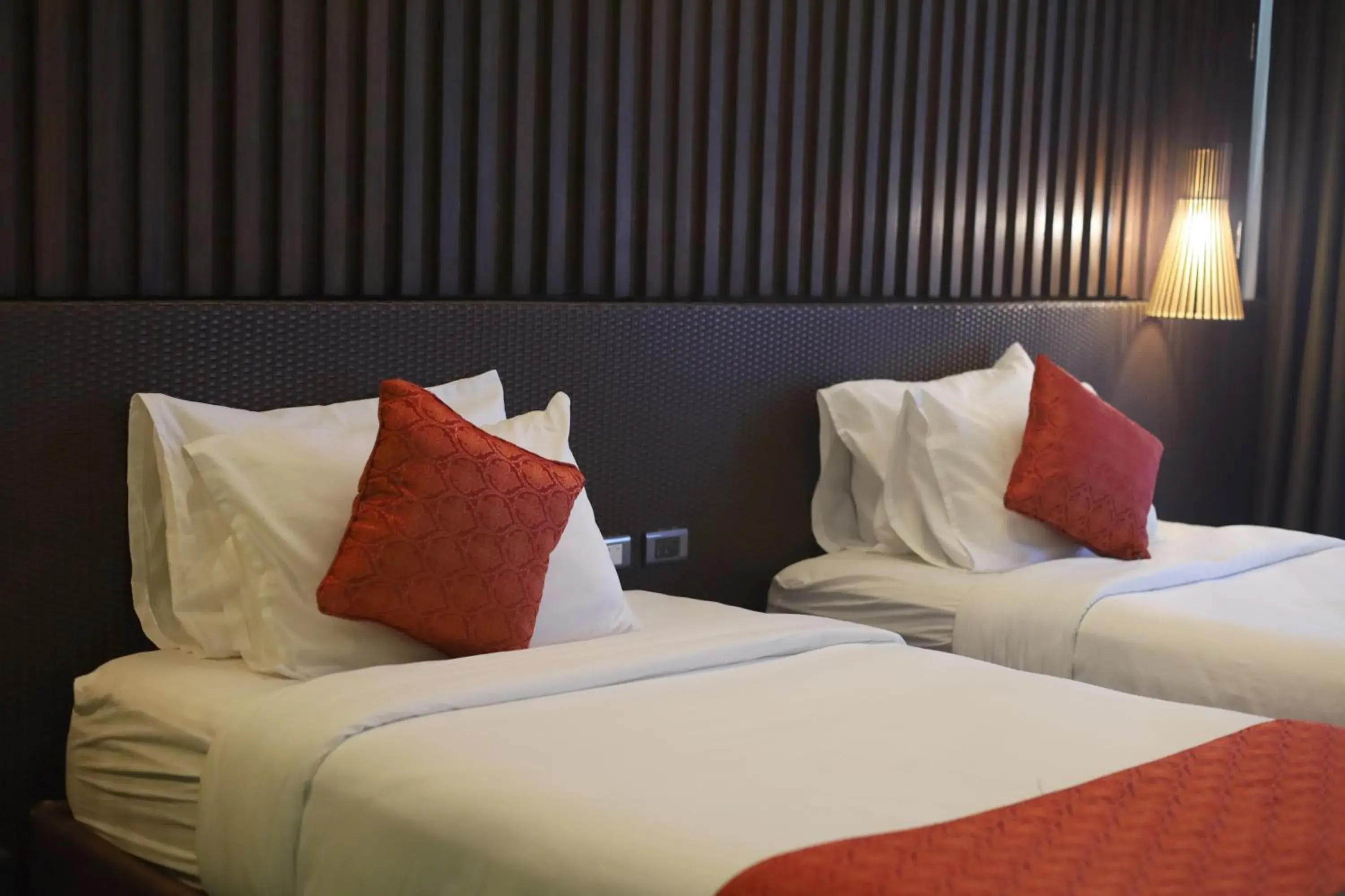 Bed in Orange Pearl Beach Resort Bed in Orange Pearl Beach Resort