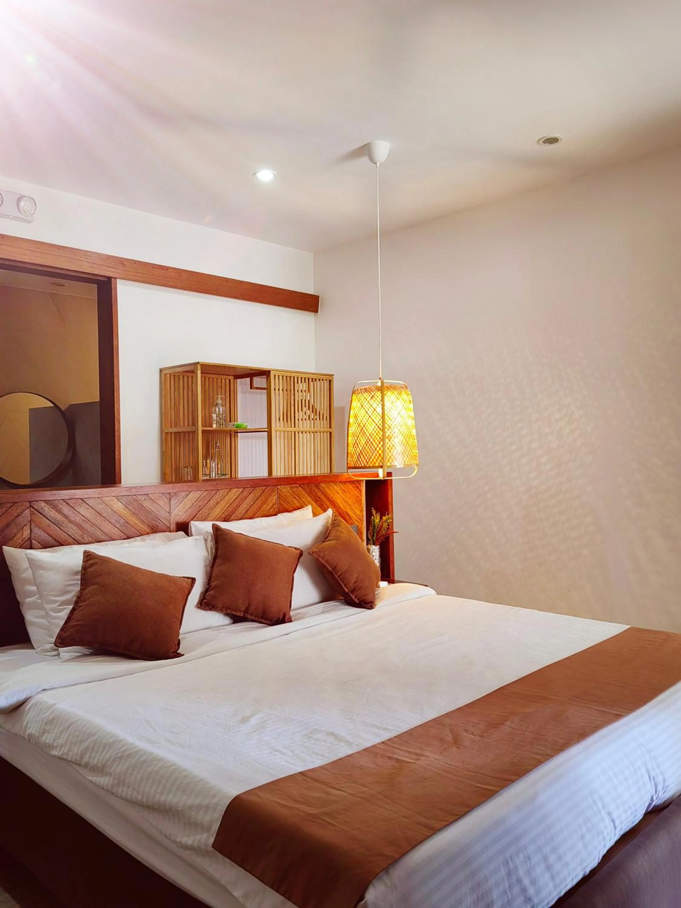 Bed in Orange Pearl Beach Resort