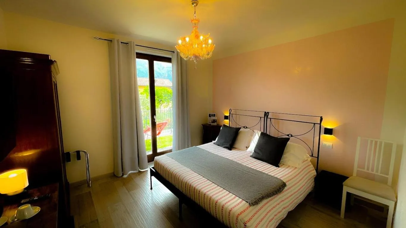 Bed in Charming Bellagio Boutique Hotel