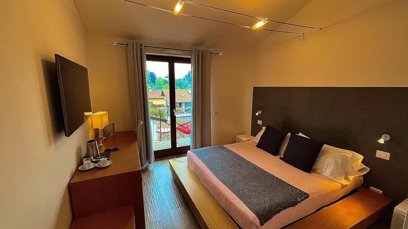 Bed in Charming Bellagio Boutique Hotel