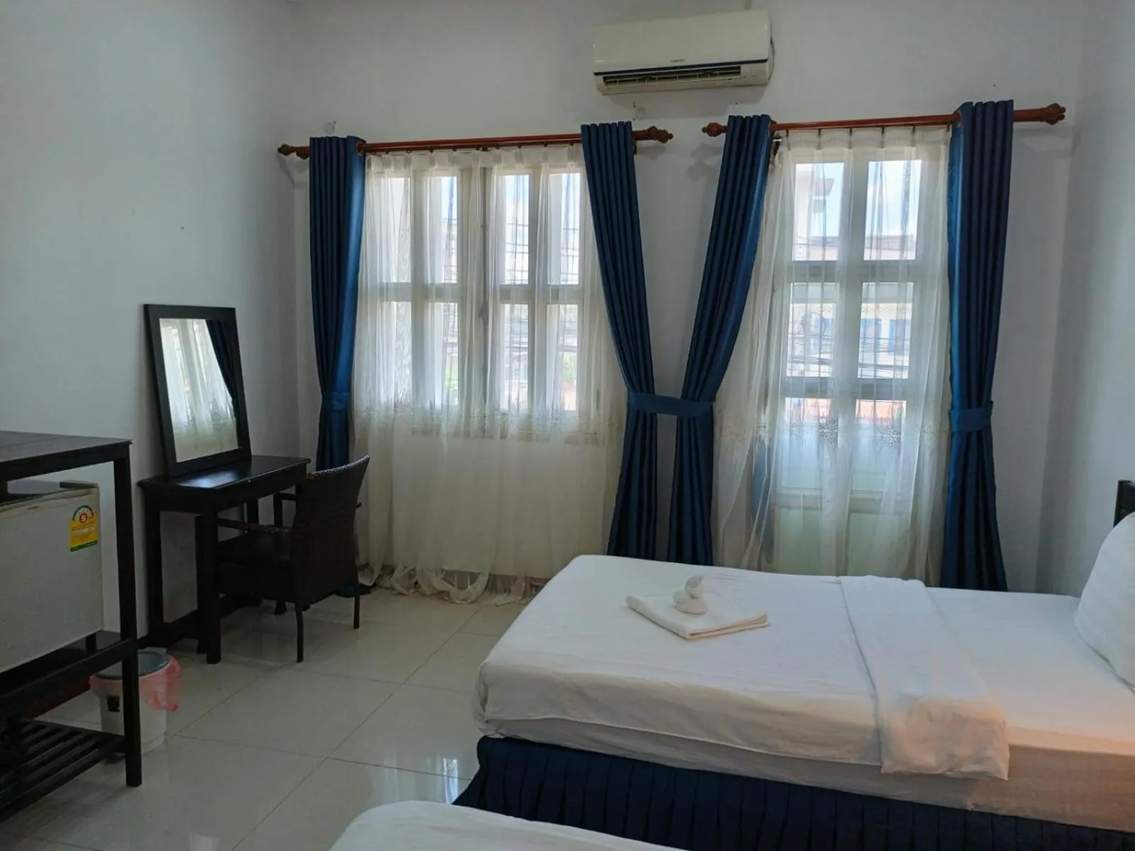 Bed in SUBINH HOTEL AND RESTAURANT