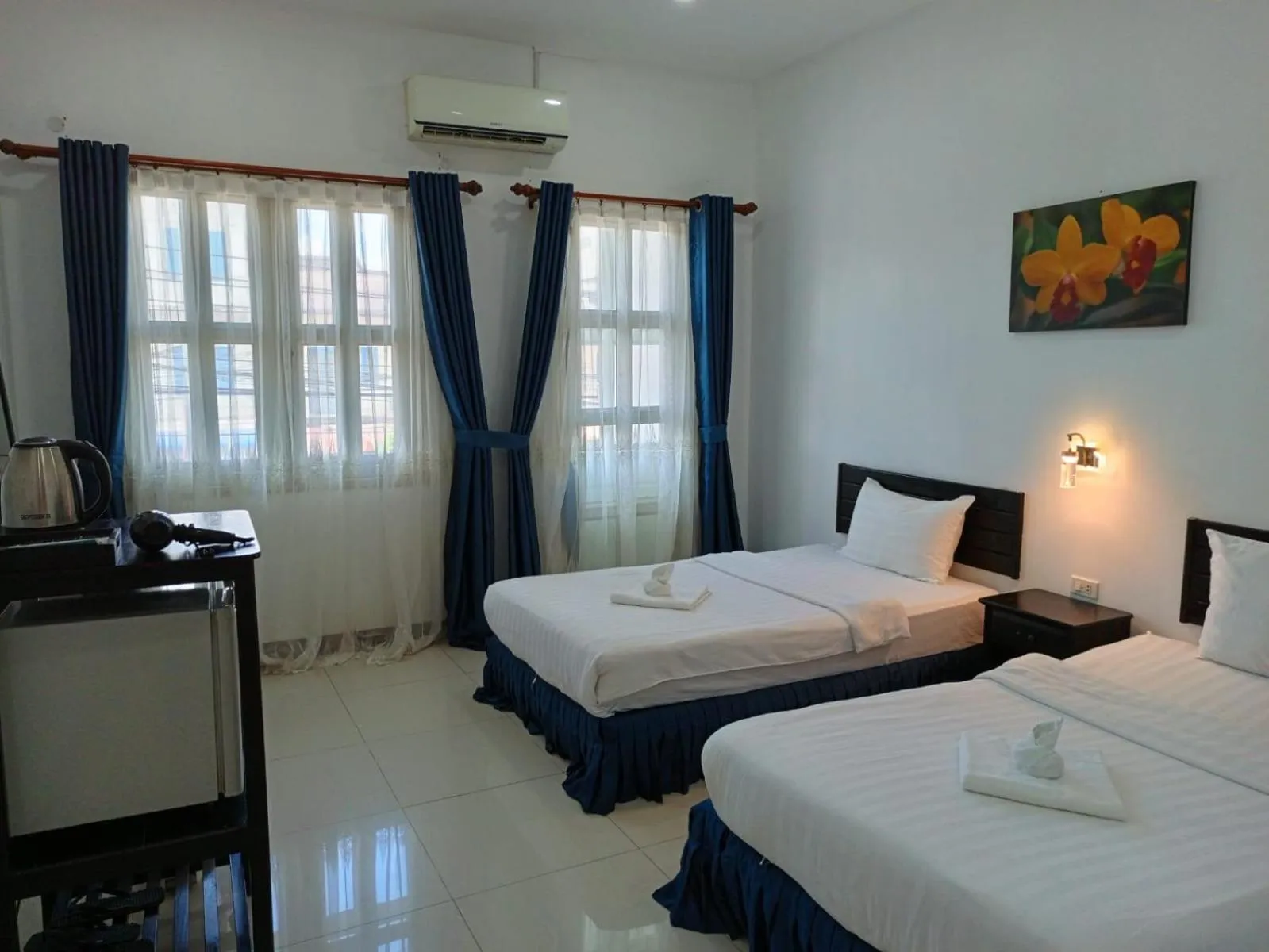 Bed in SUBINH HOTEL AND RESTAURANT