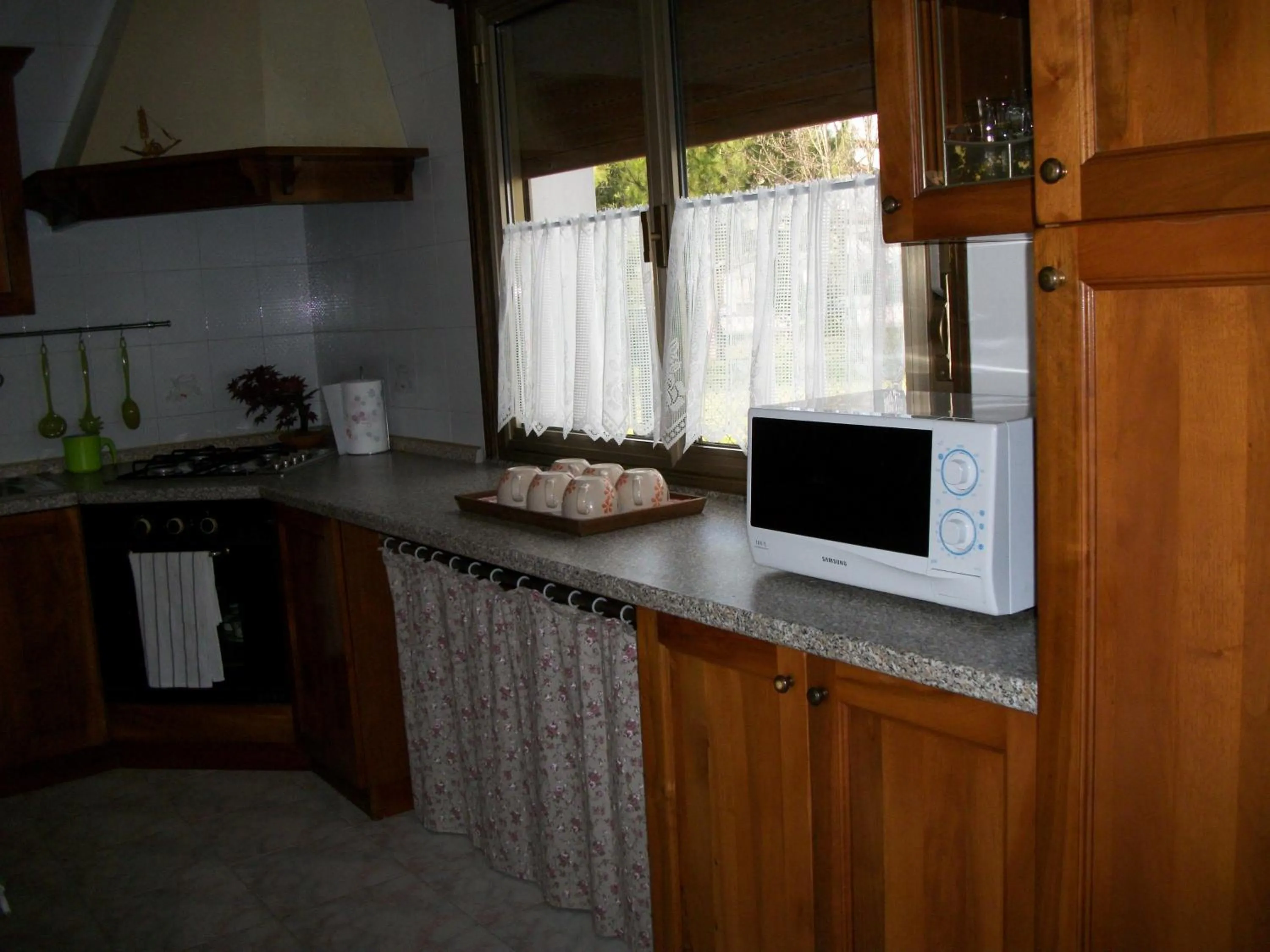 Communal kitchen in B&B A Un Passo Da