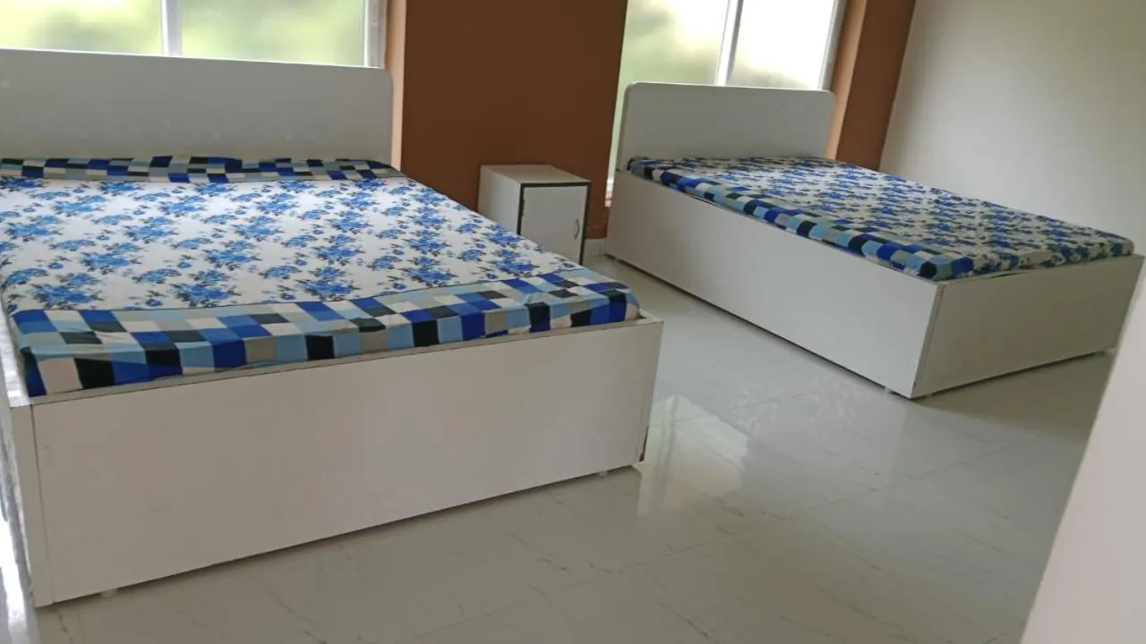 Bed in Le Grace Kovalam