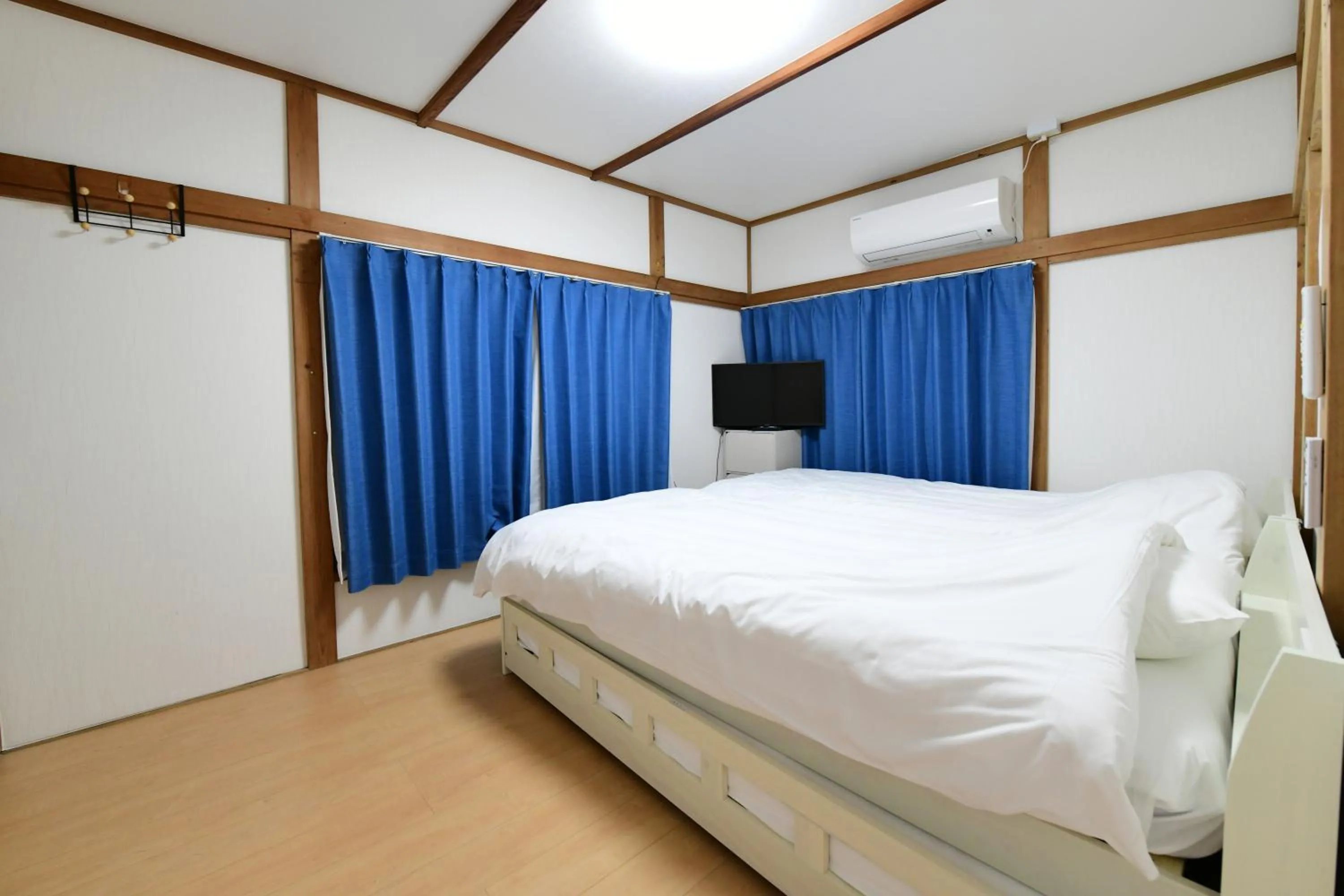 Bed in JH Yellow Guest House