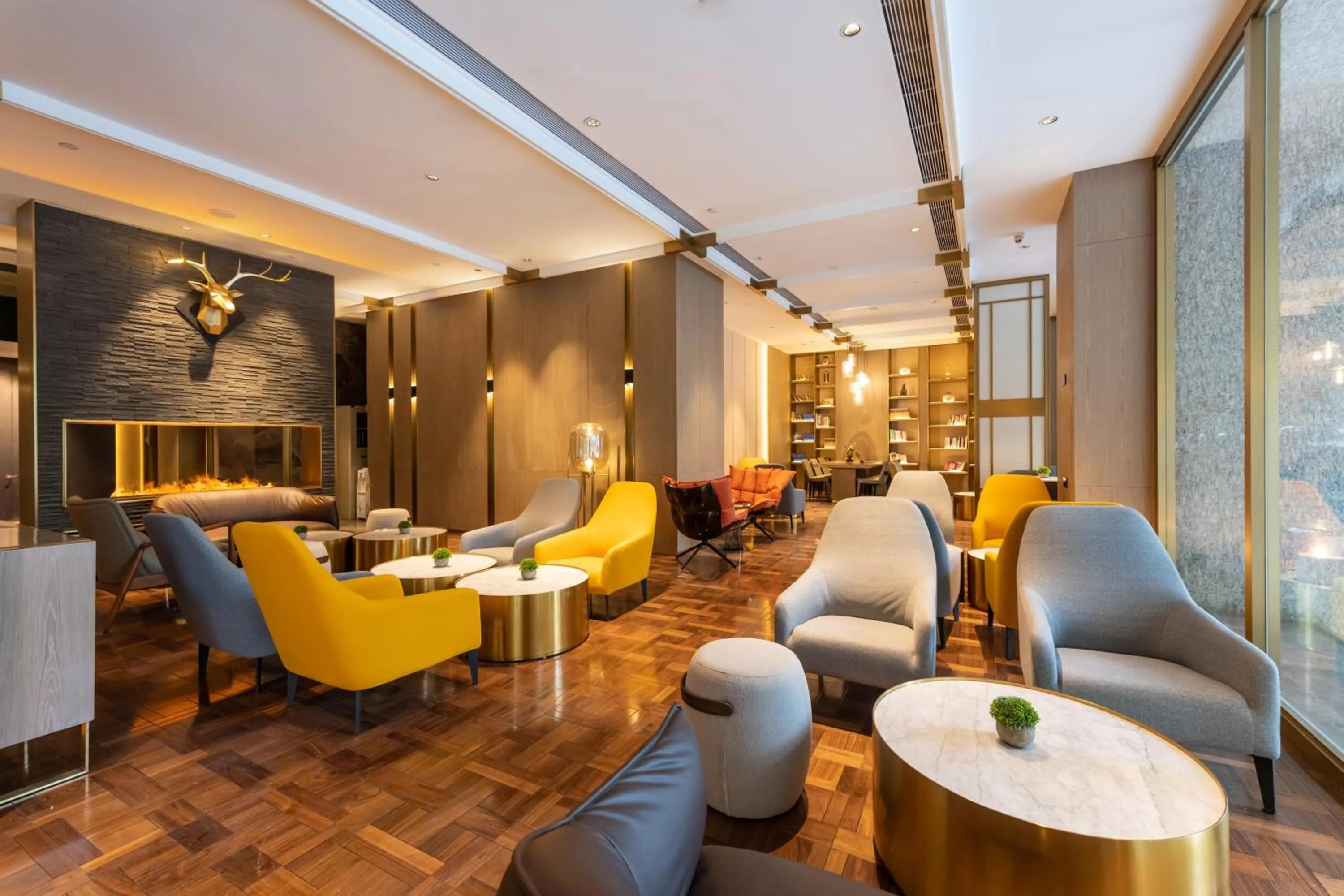 Lobby or reception in Echarm Plus International Hotel Ouzhuang Metro Station Branch - Free Deliver Service to Canton Fair Complex During Canton Fair Period