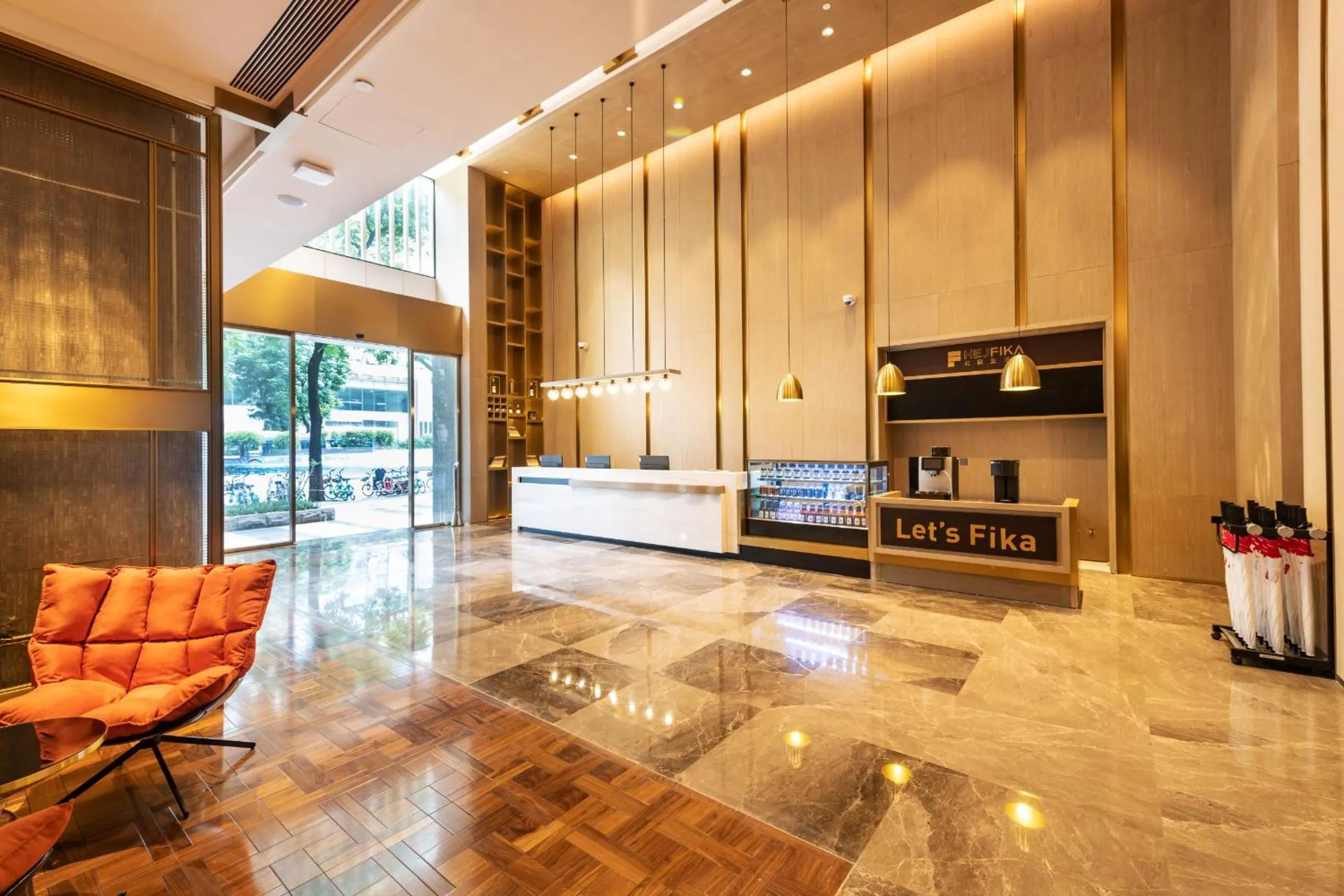 Lobby or reception in Echarm Plus International Hotel Ouzhuang Metro Station Branch - Free Deliver Service to Canton Fair Complex During Canton Fair Period
