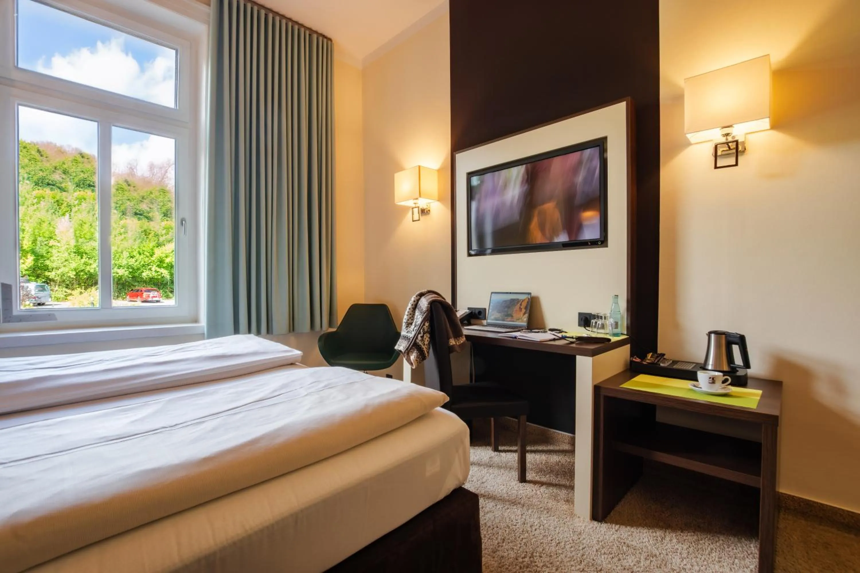 Photo of the whole room, Bed in Parkhotel Bad Rehburg