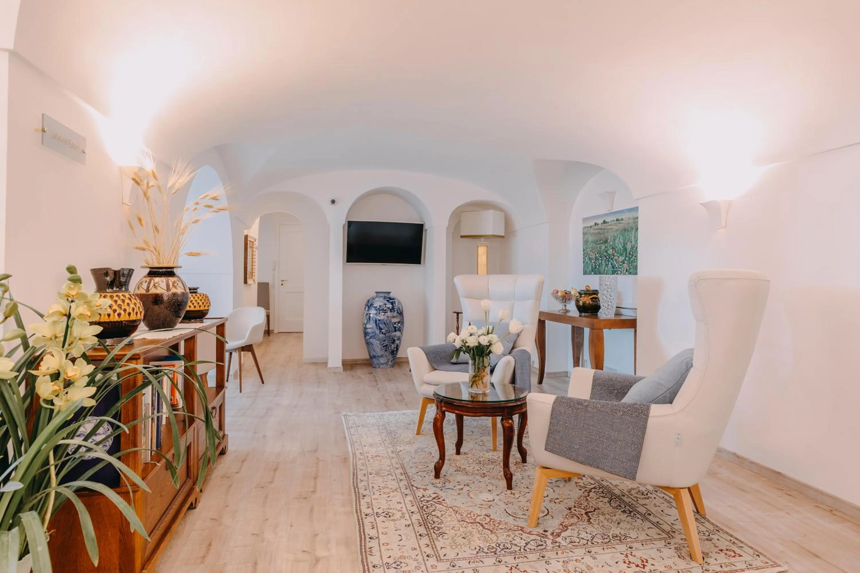 Communal lounge/ TV room in Palazzo Pascal