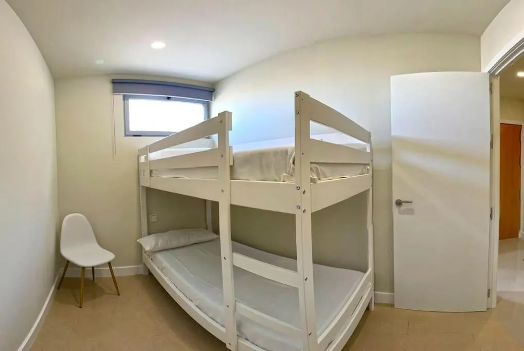 Bed in Apartamento Fenix - Recién renovado y vistas al mar
