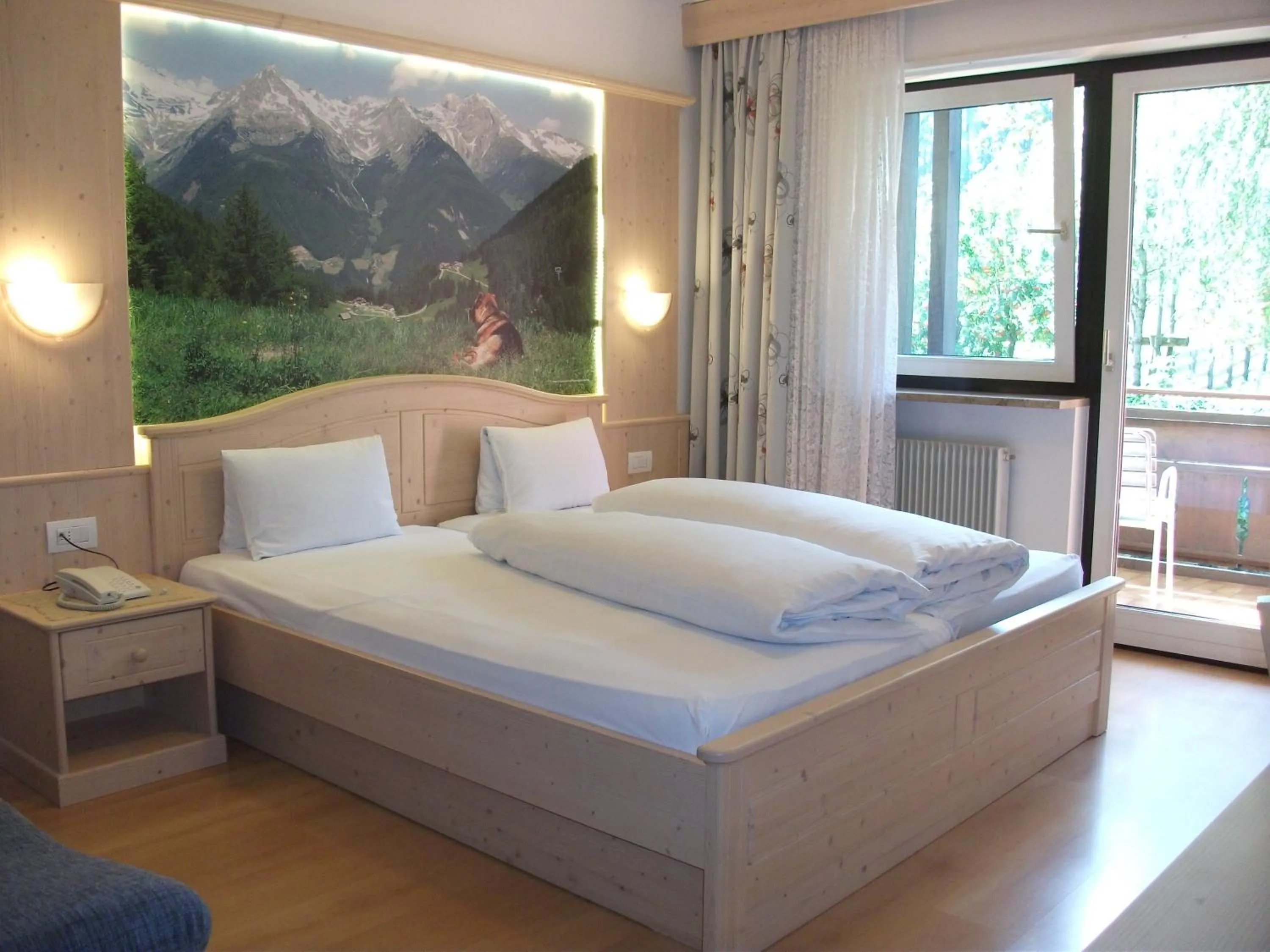 Living room, Bed in Hotel Schwarzbachhof