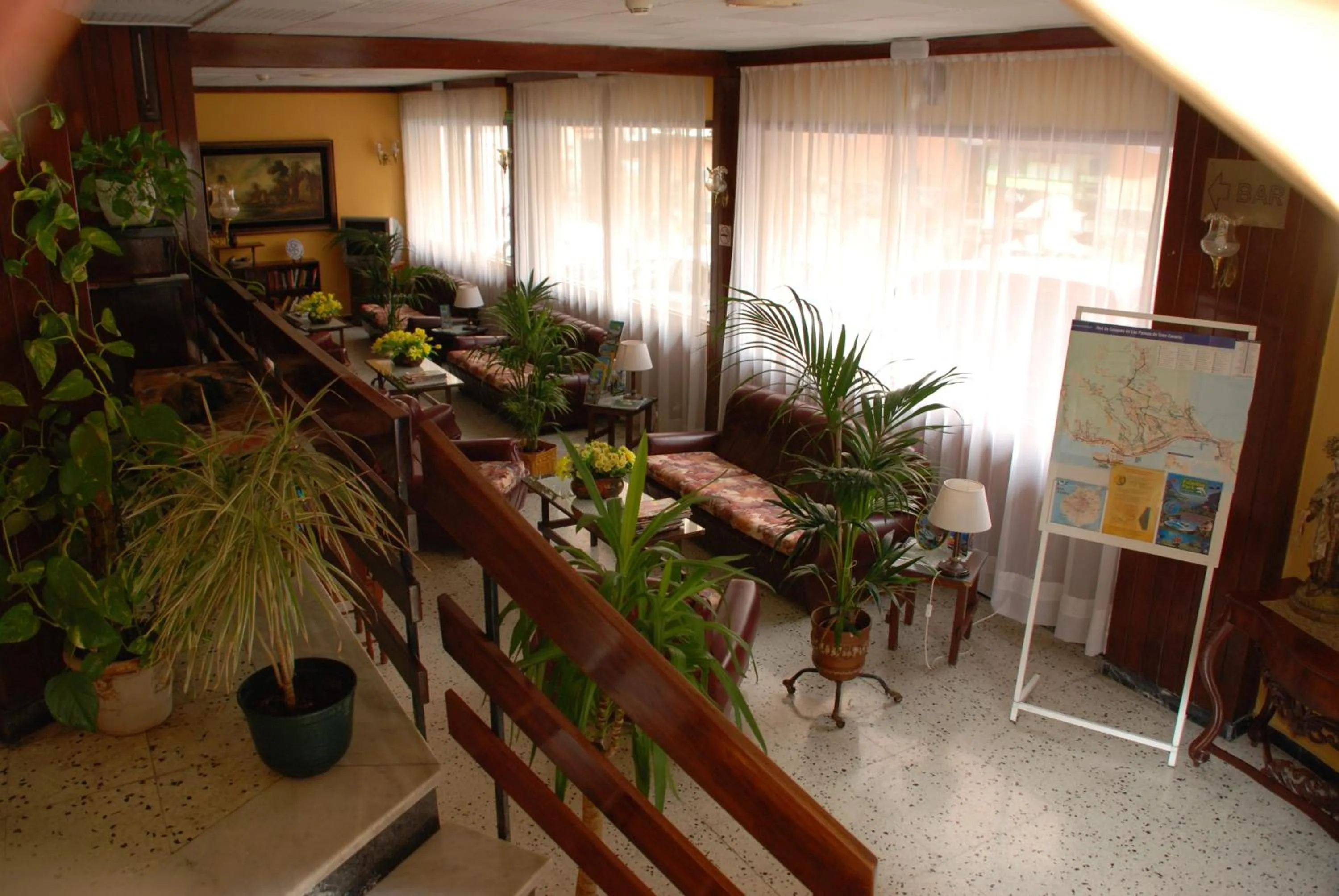 Communal lounge/ TV room in Hotel Olympia