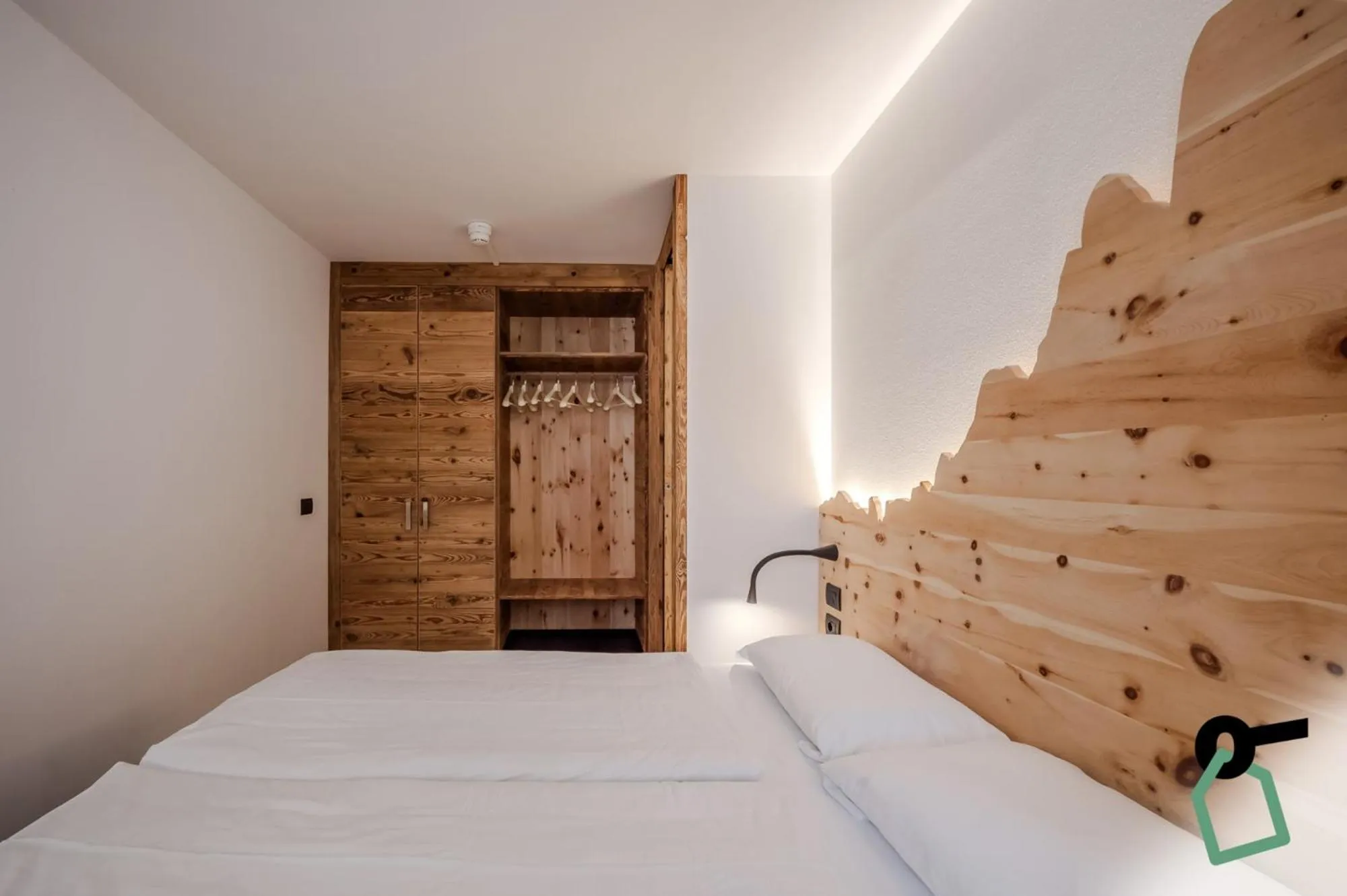 Bed in HOTIDAY Apartment Collection - San Martino