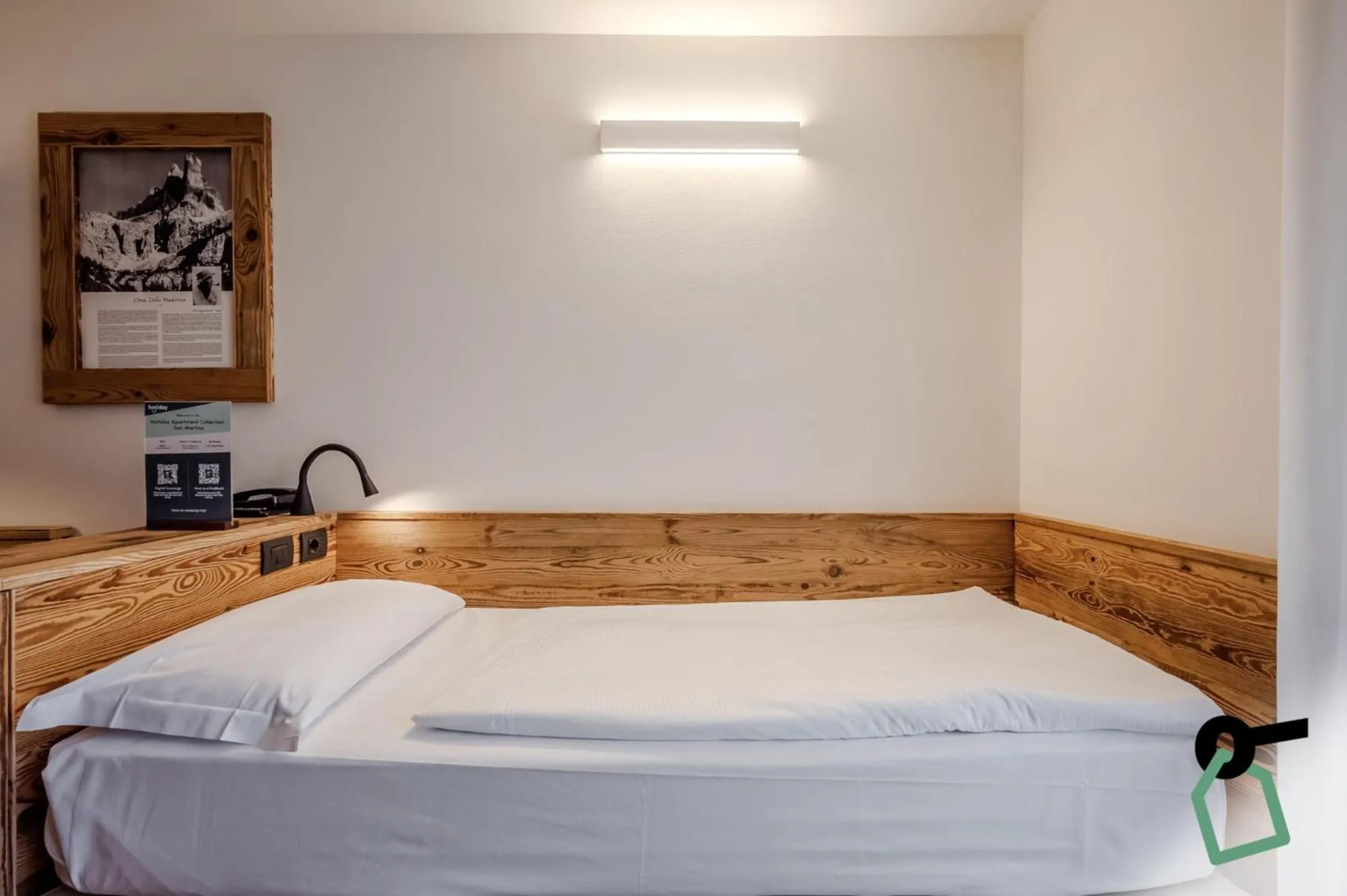 Bed in HOTIDAY Apartment Collection - San Martino