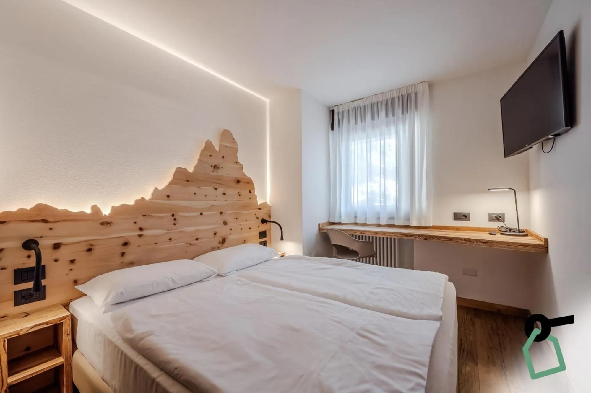 Bed in HOTIDAY Apartment Collection - San Martino