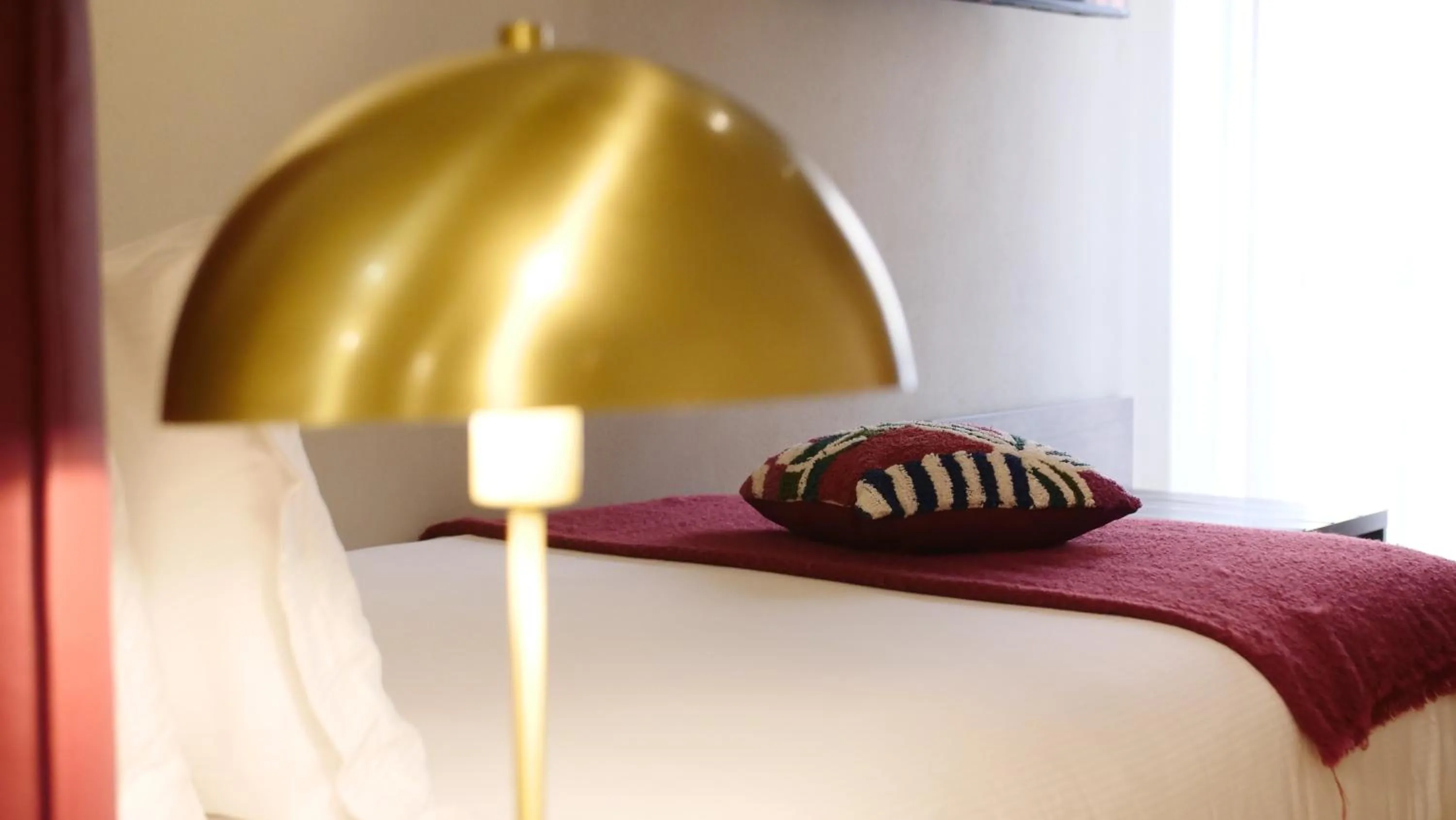 Decorative detail, Bed in Hotel Battisti 31