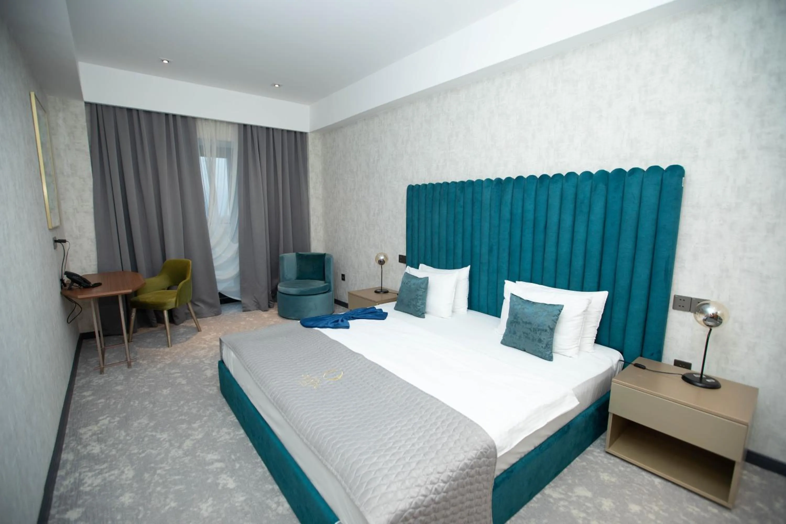 Bed in Arena Grand Hotel