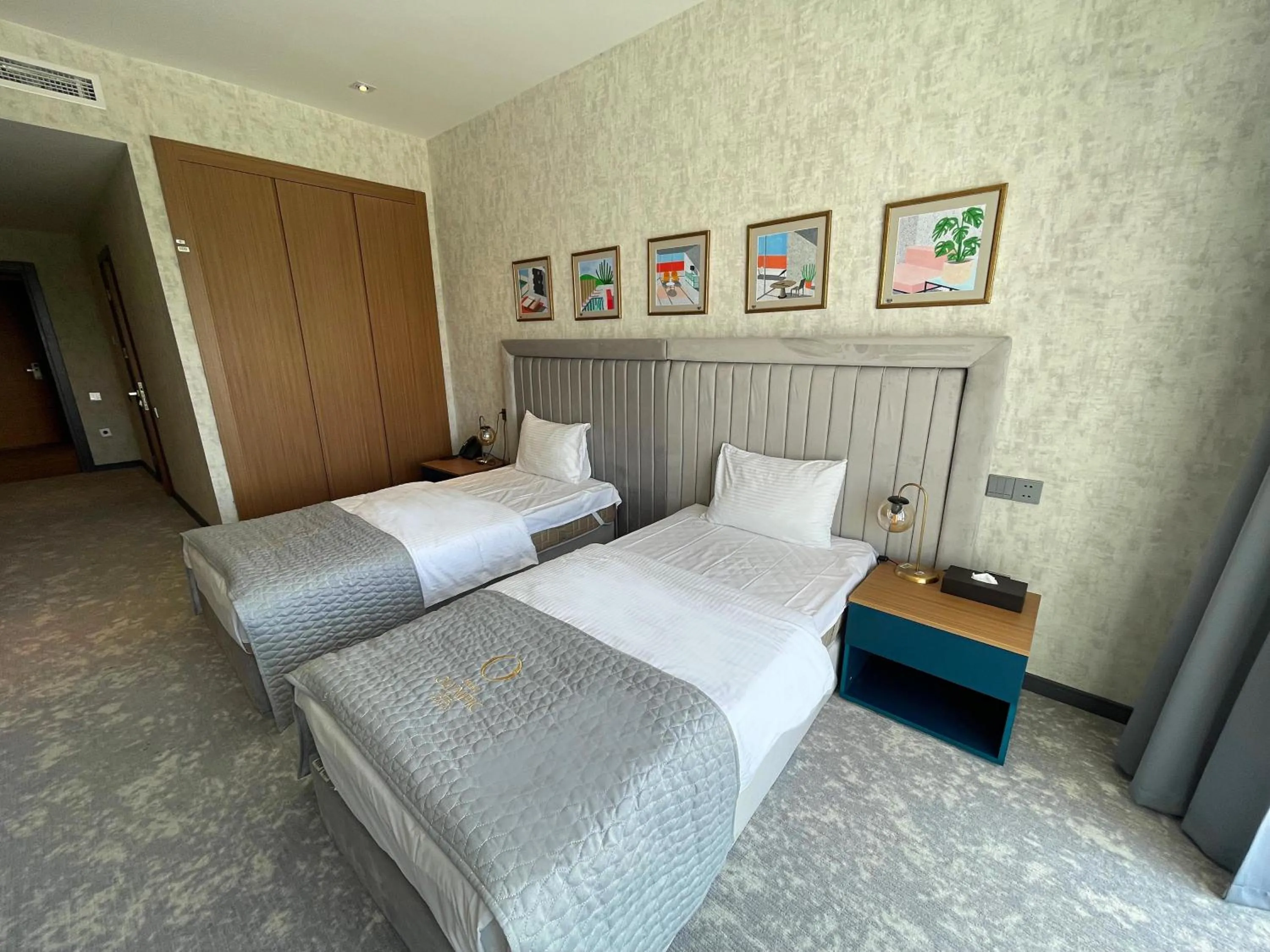 Bed in Arena Grand Hotel