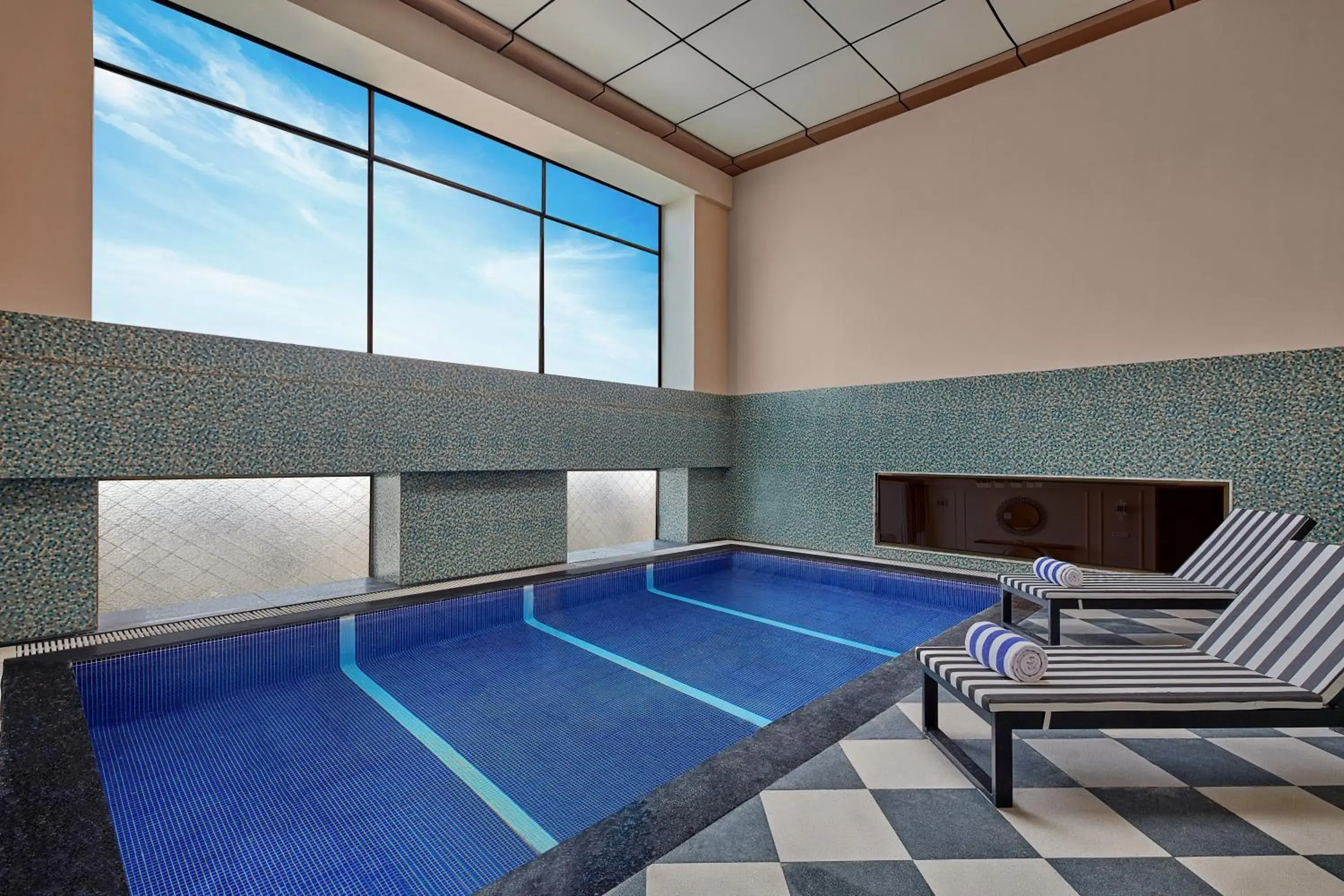 Swimming pool in Doubletree By Hilton Varanasi Swimming pool in Doubletree By Hilton Varanasi