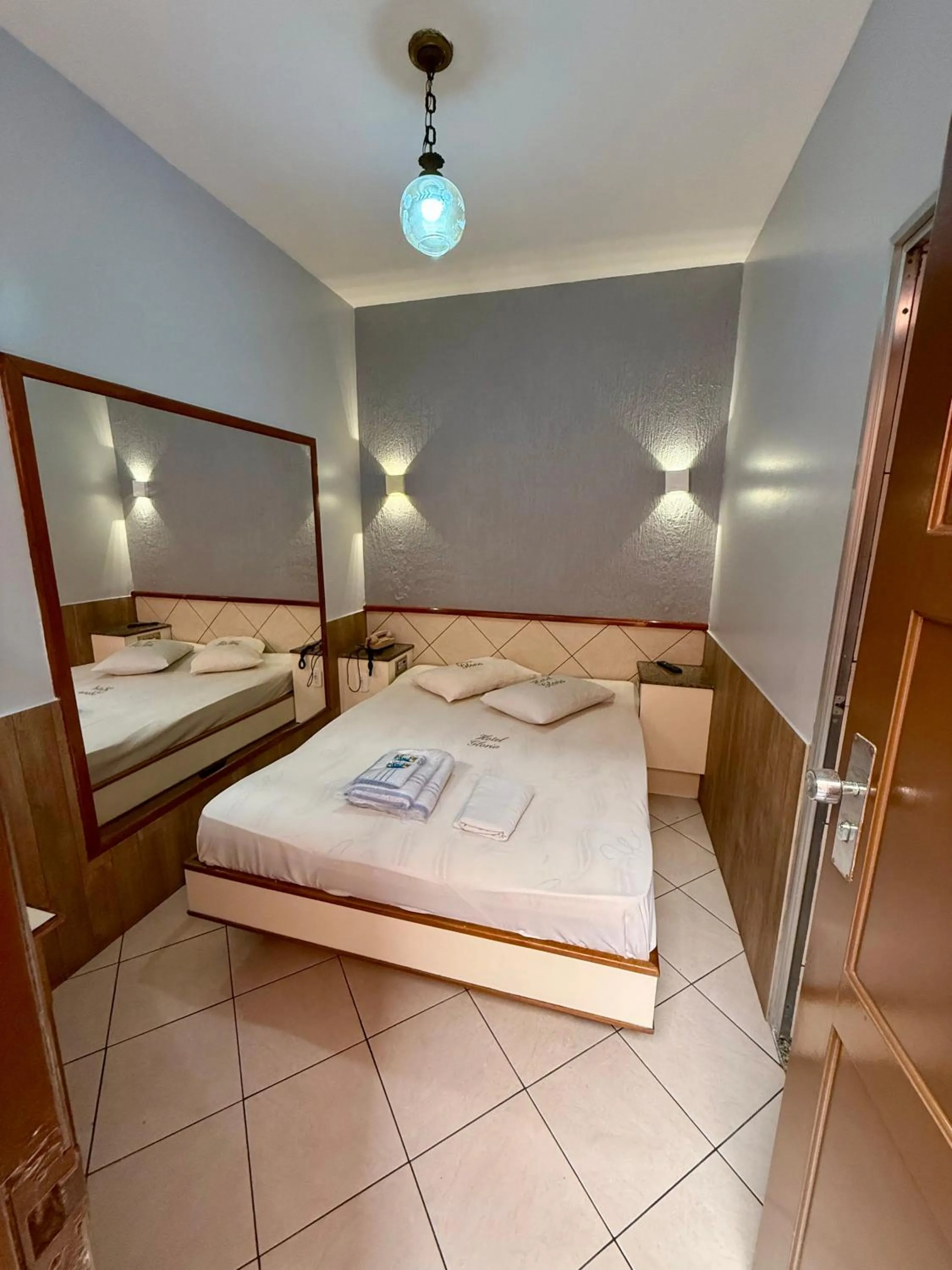Bed in Hotel Glória