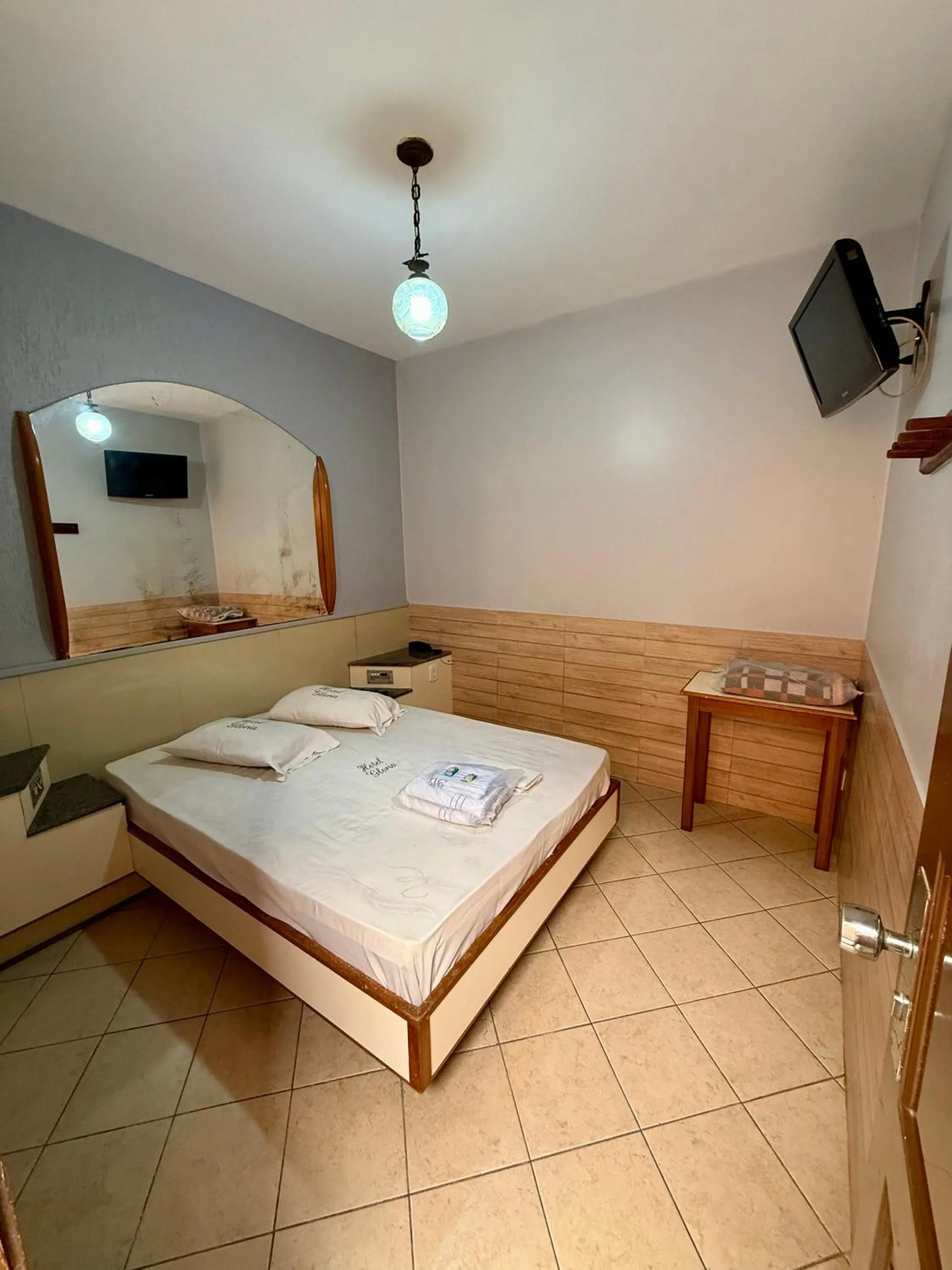 Bed in Hotel Glória