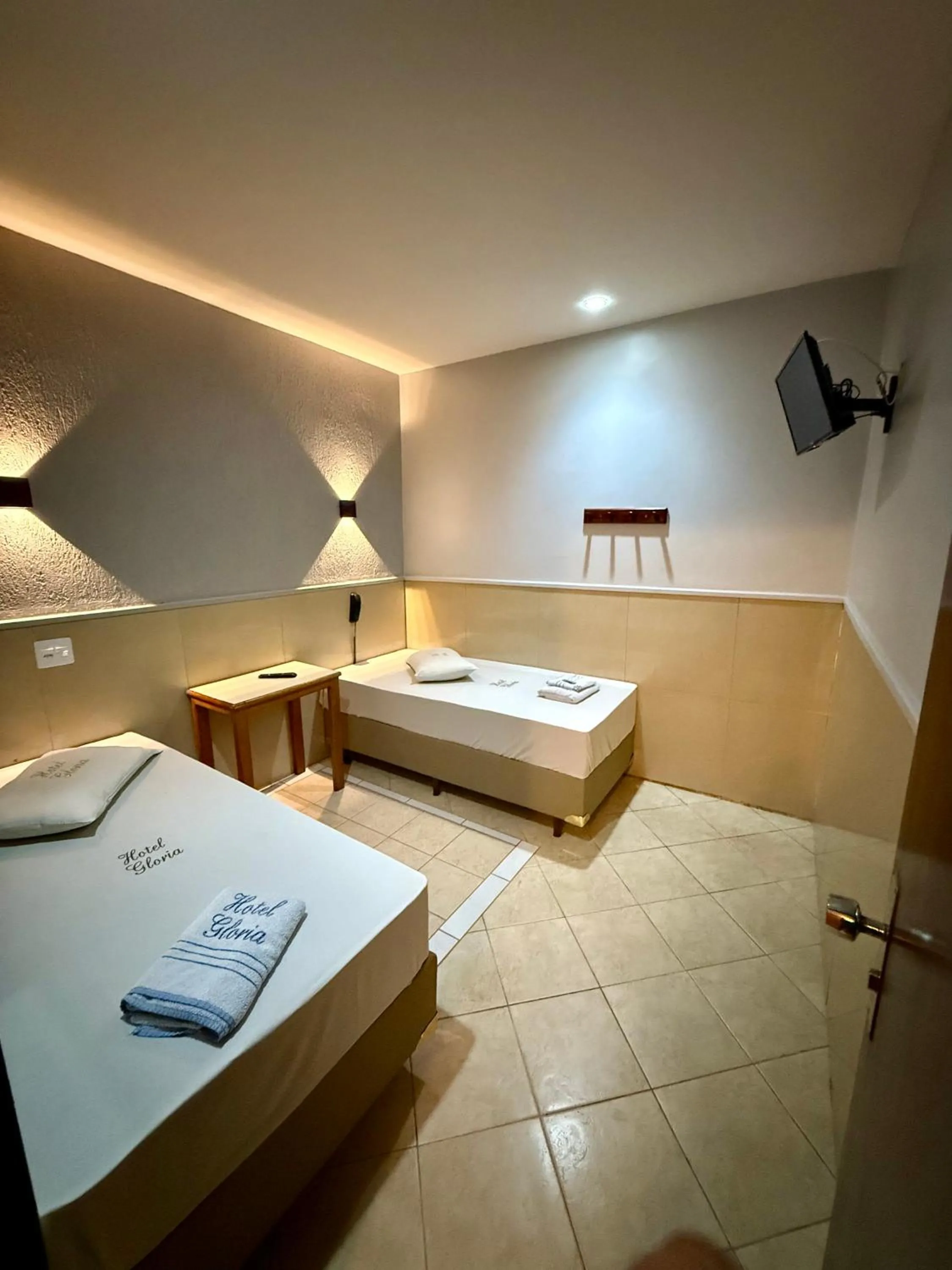 Bed in Hotel Glória